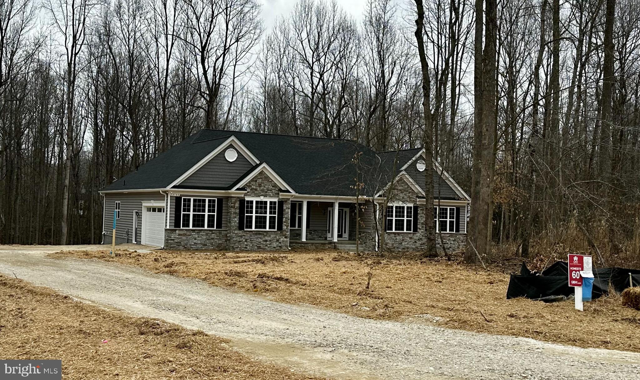 Customers building their dream QBHI home in the beautiful Fischer's Grant community, located on the outskirts of LaPlata.  This Winchester floorplan features 4 bedrooms on the main level. Owners suite has tray ceilings, 2 walk in closets, full bath with deluxe shower, separate vanities and soak in tub.  Upgraded kitchen with Island and breakfast bar, screened porch off kitchen area to enjoy sitting in you private backyard.  Family room has tray ceiling and gas fireplace. Call to build your dream home today!