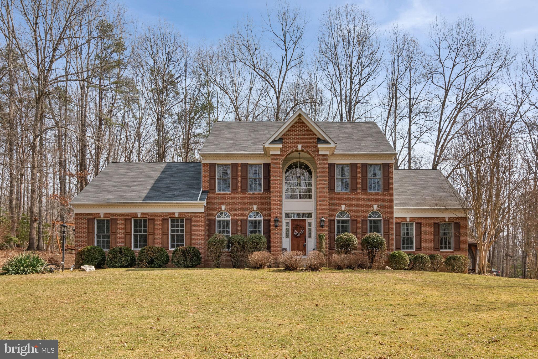Looking for a private retreat just a hop, skip and jump from Warrenton? Memories are just waiting to be made here! This stately 4bd/4.5 bath home is just bursting with suprises in every corner! A warm, welcoming foyer with lovely hardwood floors leads to your open family room  in the heart of the home, with soaring cathedral ceilings, majestic gas fireplace, and loads of natural light.  Spacious kitchen with generous counter and cabinet space opens to your light filled eat-in breakfast room. Kitchen leads to your lovely formal dining room space, and onto your formal living room.  One of the best suprises? A generous main level primary suite and  bath with separate jacuzzi tub and walk-in shower! Main level laundry/mud room right off the garage with more cabinet space. Upstairs finds large bedroom complete with en-suite bathroom, two additional bedrooms with hall bath.  And wait until you see the basement! Built-in cabinets enhance your home office space in this light-filled, walk-out basement. Separate den space perfect for movie or game nights, and 4th full bath for sleepover guests. Unfinished space boasts fantastic workshop with storage,  built-in wood shelves, utility tub, and more! But have you seen the backyard? The outdoors beckons with a beautifully constructed Brazilian IPE wood deck, leading to your brick patio, just waiting for your first cookout of the season! Enjoy your coffee and a good book in your charming screened, lighted gazebo and take in the view! The rear of the property finds a charming "she or he" shed, complete with electric, lighting, water,  potting bench and even more shelving. The possibilities are endless! Two car garage boasts extra storage space and second workbench , rear entry to patio.  Second shed is perfect for your mower and lawn supplies. Looking for a relaxing Sunday afternoon?  How about some fishing in your personal pond, stocked with Blue Gill, Catfish, Carp and more?  Or just tsit a spell on the lawn enjoying the sound of the fountain. Updates include * Hot Water Heater 2023 * New Roof 2019 * This property is truly unique and is waiting on her next owners to fill it with special memories. Convenient to all the beauty of Warrenton, Luray, Front Royal and more!