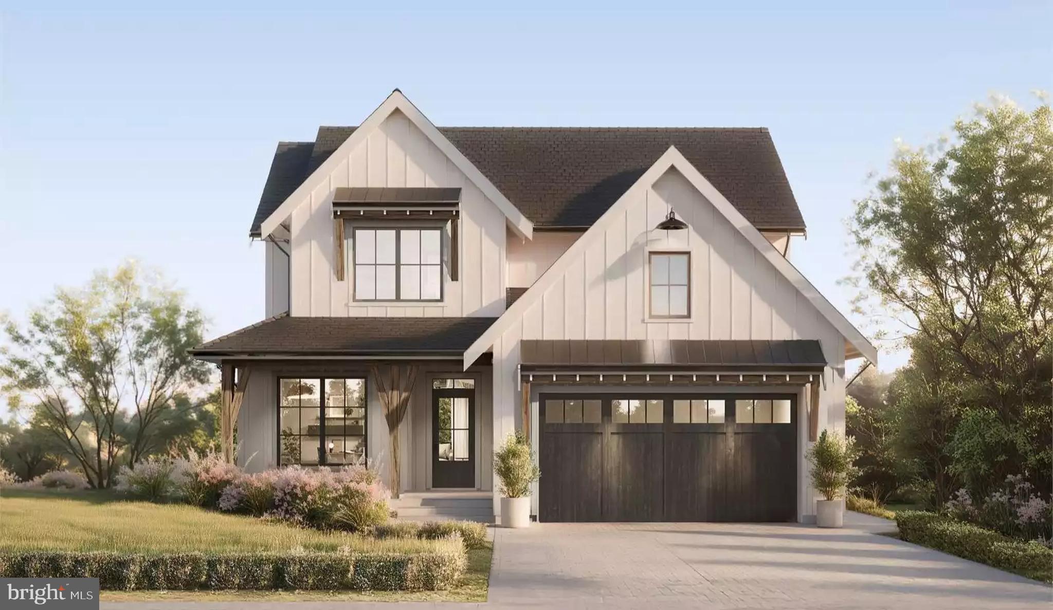 Custom-built home with other design options on a non-deed-restricted flat lot in N. Wilmington. This is an exclusive custom-built home by Barone Custom Homes.   Other floor plans available to suit your needs.  Welcome to the Woodland, a stunning 4-bedroom, 3.5 Bath modern farmhouse that pairs timeless curb appeal with a thoughtfully designed interior. Crisp board-and-batten siding, standing-seam metal roof accents, rustic timber details, and a charming covered front porch create a striking first impression, while the carriage-style two-car garage adds warmth and character to the facade.  Step inside, and the foyer welcomes you with rich hardwood-style flooring and graceful archways that set the tone for the entire home. The open-concept main level flows effortlessly from the elegant living room, anchored by a classic fireplace framed by custom wall paneling and designer sconces, into a breathtaking gourmet kitchen. Here you'll find an oversized center island with seating, quartz countertops, a gas range with a custom hood, brass-accented fixtures, and a stylish arched walk-in pantry that is as functional as it is beautiful. The adjoining dining area is wrapped in windows, filling the space with natural light and offering seamless access for everyday living and entertaining alike. Photos may include optional features, upgrades, decorator items, and landscaping not included in the standard plan or base price. All square footage, dimensions, materials, and finishes are approximate and subject to change. Final specifications and selections will be determined in consultation with the builder. Buyers should verify all details prior to purchase. Taxes will be set by the County and are pending determination based on the new home.