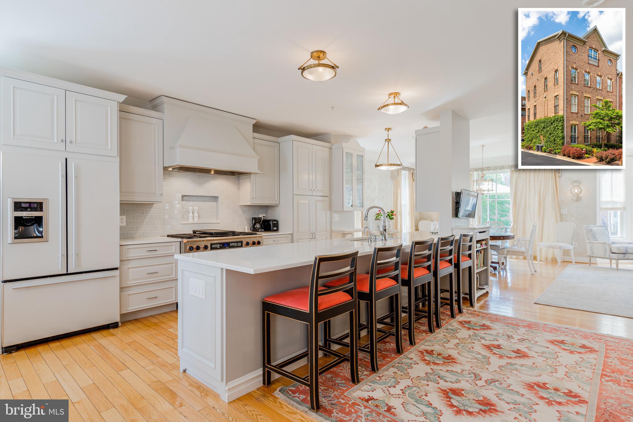 LUXURY ABOUNDS IN THIS 4100+SQ. FT. GARAGE TOWNHOME IN CANTON'S WATER ORIENTED NORTH SHORE COMMUNITY! Inviting entry level sitting room w/ wet bar and full bath, the main level is perfect for entertaining w/ an open floor plan, sundrenched living room & dining area, powder room, & a custom gourmet kitchen that would impress any chef with high end stainless steel appliances, Quartz countertops, commercial grade gas stove, and wine cooler.  The third level offers a generously sized bedroom suite w/ walk-in closet and full bath, 2nd bedroom w/ a hall bath, bedroom level laundry, and a spacious office w/ hardwood floors & crown molding.  The expansive Master suite is located on the top level and is the perfect retreat with a sitting area w/ a gas fireplace, walk-in closet w/ built-ins, private balcony with water views, and a spa bath w/ a large whirlpool tub & glass enclosed shower.  Parking is a breeze with the 2 car garage and 3 additional parking spaces outside of the garage.  Need more bedrooms?  No problem - the entry level room or the office can easily be converted to extra bedrooms.  Perfectly located steps from dining and the waterfront Promenade!  This property will wow your most discerning buyer!