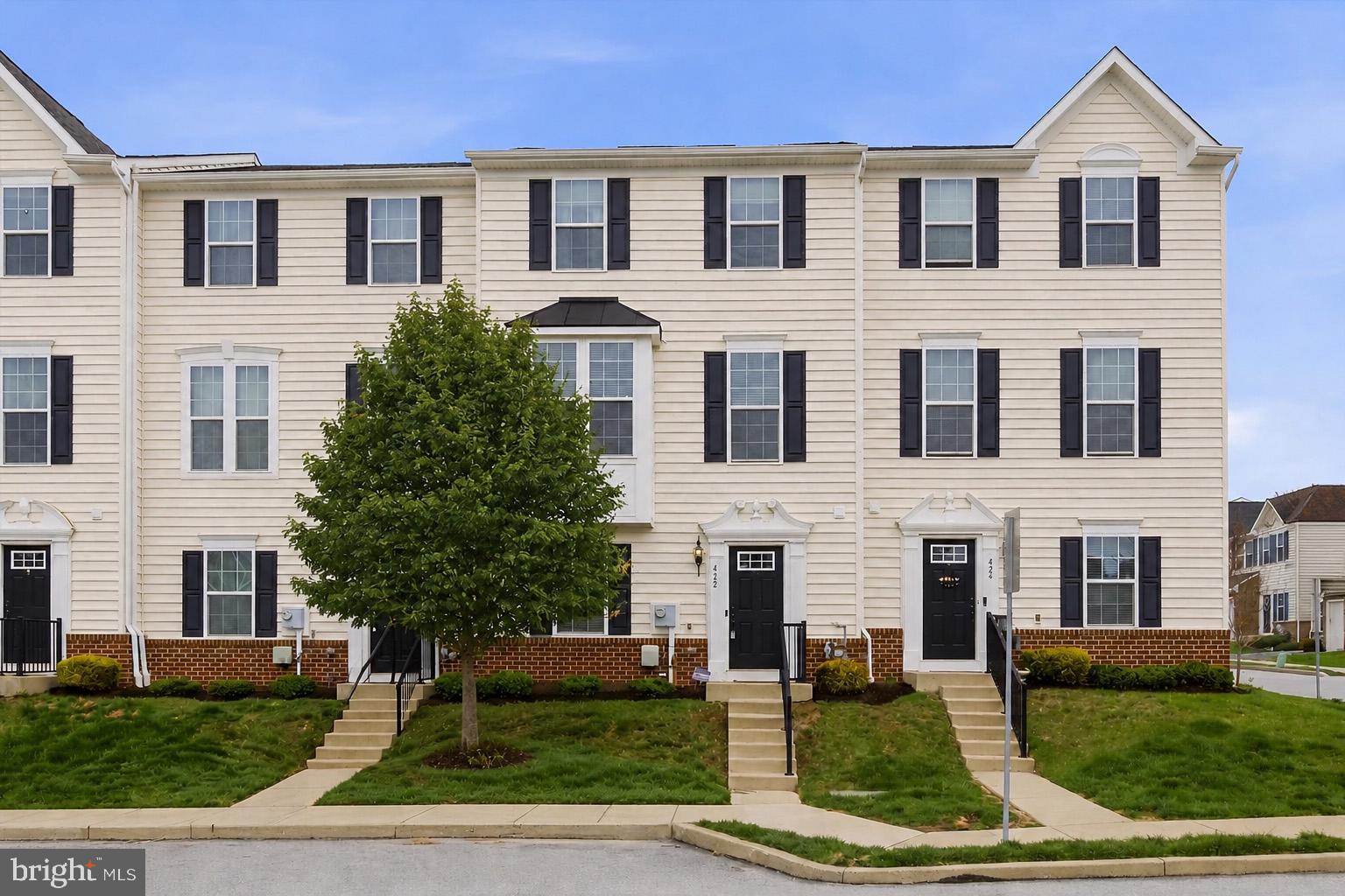 Welcome to 422 Lopata Rd, a beautifully maintained 3-bedroom, 2.5-bath townhome that perfectly combines comfort, style, and modern convenience.

Step inside to a versatile lower level featuring a convenient half bath and flexible living space ideal for a home office, recreation room, gym, or additional storage. This level also offers direct access to the attached 2-car garage for added ease and functionality.

Upstairs, the bright and open main living area is thoughtfully designed for both everyday living and entertaining. The spacious living and dining areas flow seamlessly into the modern kitchen, with easy access to a private deck — the perfect spot to relax or host guests.

The upper level boasts a generously sized primary suite complete with a private full bath, along with two additional bedrooms and another full bathroom. A conveniently located upstairs laundry area adds to the home’s practical and efficient layout.

Thoughtful updates throughout the home include a new dishwasher (2025), updated carpeting, and fresh paint in select areas. Enjoy modern smart-home features such as a Nest thermostat, security system, WiFi-enabled garage door opener, built-in speakers, and Ethernet wiring on every floor.

Located in a desirable neighborhood close to schools, parks, shopping, and everyday conveniences, this move-in ready home offers the perfect blend of space, functionality, and modern living.