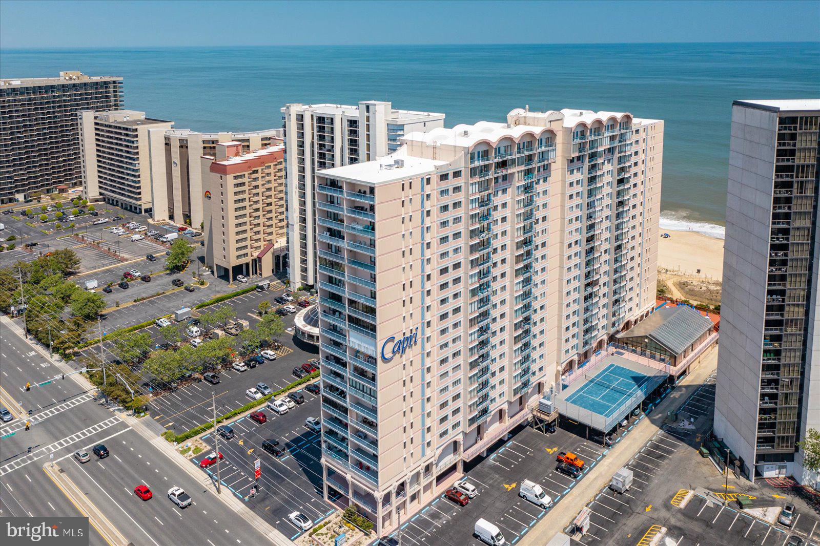 This well maintained unit in the Capri is perfectly situated on the 10th floor for the best of both worlds views of the ocean & bay. It's bright and idealy south facing to soak up the sun on your balcony. This unit is incredibly well maintained w/ regular HVAC service, new furnishings, drop ceiling in kitchen w/ LED lighting, some new appliances & plumbing updates as well as new vents  & hardware finishes.  The amenities on 2nd floor are great for all ages and include a gym, tennis courts, basketbal court, huge heated indoor pool, saunas & a library. There are no pending assessments at the Capri!