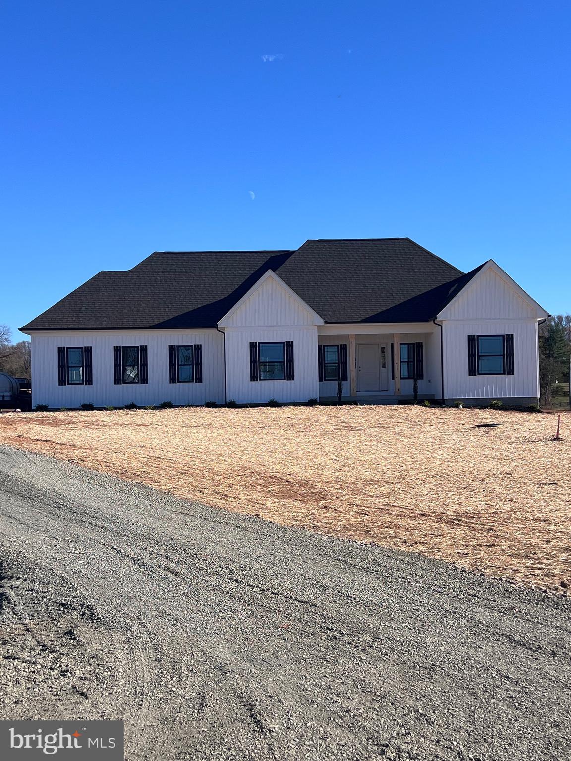 THIS  CUSTOM BUILT BRAND NEW RAMBLER IS FINISHED AND READY TO MOVE IN *   1.9 ACRE LEVEL LOT * 5" RED OAK HARDWOOD FLOORING * 9' CEILINGS  ON MAIN LEVEL *  42" KICHEN CABINETS * GRANITE IN KITCHEN AND BATHS * MASTER BATH WITH WALK-IN SHOWER AND SOAKING TUB,  DOUBLE SINKS,  HEATED TILE FLOOR * STAINLESS STEEL GE APPLIANCES * TREX  DECK ON REAR OFF OF FAMILY ROOM * UNFINSHED BASEMENT WTH WALK-UP STAIRCASE TO OUTSIDE IN REAR * 3 PIECE ROUGH IN FOR FUTURE BATH IN BASEMENT * 2 CAR SIDE LOAD GARAGE * CONCRETE FRONT PORCH * ELECTRIC FIREPLACE * LAUNDRY ON MAIN LEVEL * DOUBLE HUNG TILT-IN WINDOWS.