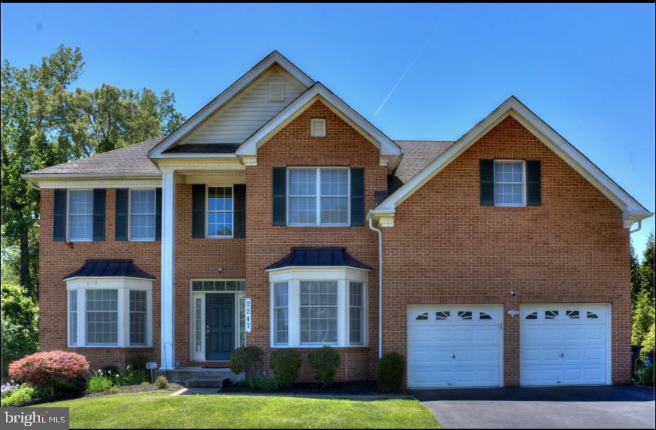 Welcome to this magnificent Toll Brothers "Columbia" model brick Colonial, perfectly situated on a premium wooded lot in the desirable Cedarday community.
Offering ultimate privacy and a serene backyard setting, this home opens to a grand two-story foyer filled with natural light, flanked by an elegant formal living room and a dining room with gleaming hardwoods.
The seamless, open-concept layout leads to a chef’s dream: an extended gourmet kitchen (featuring a 5-foot extension) complete with a center island, granite countertops, 42-inch cabinetry, and stainless steel appliances. Adjacent, the inviting family room showcases a cozy gas fireplace set under a dramatic cathedral ceiling. A private main-level home office with an elegant bow window, a well-equipped laundry room, and access to the 2-car garage complete the main level.
Upstairs, double doors open to a luxurious owner's suite featuring a private sitting area, a walk-in closet, and a spa-like ensuite bath. The upper level also boasts a second en-suite bedroom and two additional bedrooms joined by a Jack-and-Jill bath.
The fully finished, expansive walk-out basement provides endless opportunities with a large recreation space, a fifth bedroom, a full bathroom, and ample storage.
Built with premium quality, the home features high-end Andersen windows, high-efficiency Toll Brothers insulation, and a reliable Carrier HVAC system. Outside, enjoy exceptional outdoor living on the maintenance-free Trex deck overlooking the quiet woods, with a convenient staircase leading down to a finished patio. Ideally located just minutes from premier shopping, dining, and everyday conveniences, this stunning home perfectly combines comfort, luxury, and an unbeatable setting.