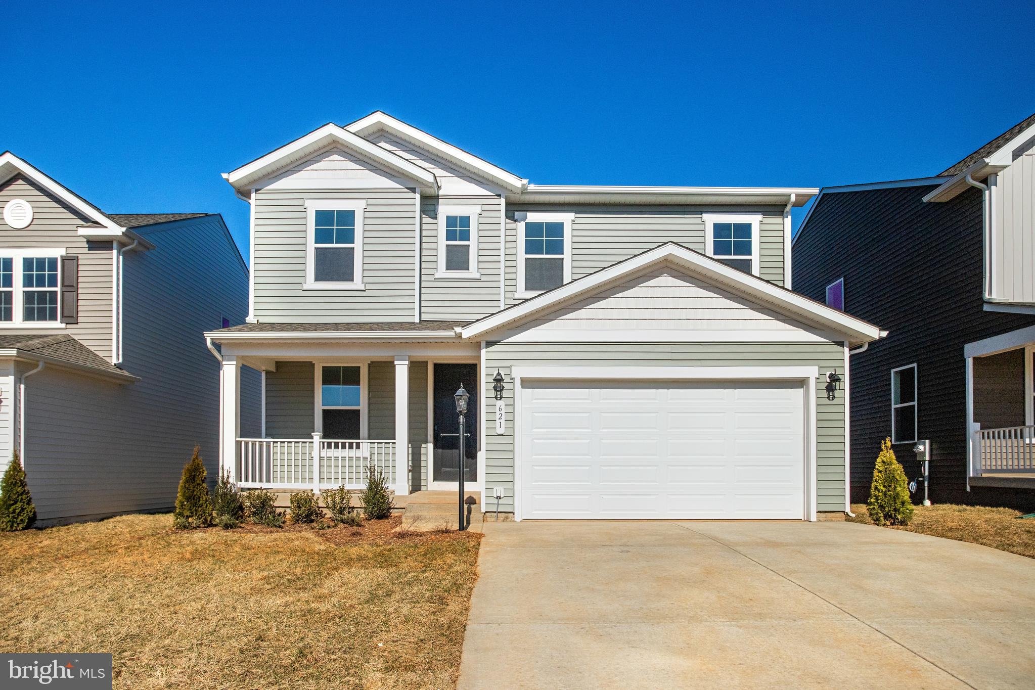ASK ABOUT SPECIAL FINANCING! $0 down payment USDA financing eligible! This Lapis by Richmond American will be move-in ready in January!!  There's a lot to love about the Lapis floor plan! The charming front porch leads to an inviting, open layout. Walking through the front door to the left is a adaptable flex room and open oak stairs and beyond that is the main living space. The kitchen with a center island and large walk-in pantry flows into a dining room and a great room, completed by a center-meet sliding door – leading to your 29x10 covered Deck. Upstairs, the primary suite offers a full private bath and a generously sized walk-in closet. Adjacent are two additional bedrooms, each with their own walk-in closets and a convenient loft for extra living space. Curated finishes round out this home such as Blanco Maple quartz countertops, Aristokraft White cabinets, 7” Kenwood LVP floors on the main level, and sleek matte black light and plumbing fixtures. Welcome to Round Hill Meadows in Orange! Residents will appreciate the small-town charm as well as the conveniences of being close to routes 15, 522 and 3, award-winning wineries, Lake Anna State Park, Lake Orange and the Rapidan River nearby for fishing, swimming, kayaking and boating! Model is OPEN but visitors are encouraged to call ahead to be guaranteed a dedicated appointment.