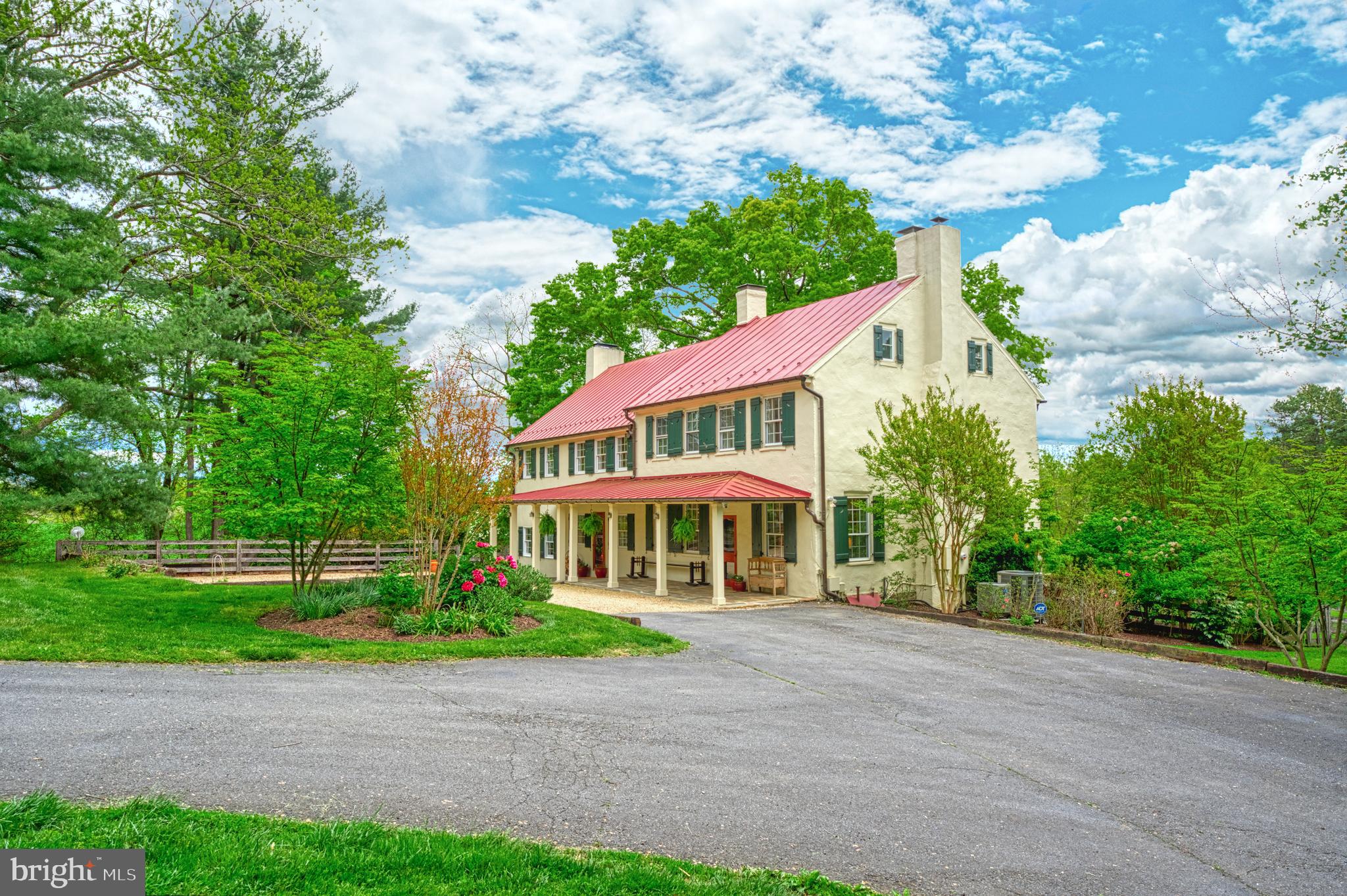 A Unique, Historic Equestrian Estate

Somerset Farm is an historic home with recent renovations and additions.  The beautiful grounds with towering trees, brilliant perennial gardens, and manicured lawns make this a truly breathtaking estate. 

The home is the best of old and new.  Originally built in the 1830's, the home maintains its original historic charm featuring wide heart-of-pine wood floors, historic doors, iron block locks, round brass knobs, and large wood trim.  It has been meticulously renovated with impeccable taste boasting a cathedral ceiling on the main level, a large great room, and multiple French doors bathing the rooms in sunlight. Keeping the gourmet chef in mind, the kitchen has been totally renovated with deep countertops and inset wood cabinetry.  There is an eat-in dining area off the kitchen that is perfect for daily use.  It is surrounded by windows and French doors bringing in all the beauty of the outdoors and overlooking the pond. There are four fireplaces - two in the historic wing (one brick lined fireplace is 54” wide with original mantel and 39” high arched opening),  one in the great room with a woodstove and flue, and one in the primary bedroom.  Three finished levels of beautifully appointed living space make this a perfect home for quiet enjoyment or gracious entertaining. 

There are four bedrooms on the second level and a finished attic for a 5th bedroom or recreation room.  The primary bedroom has an on-suite bathroom with heated travertine tile floors, a steam shower, and two distinct vanities.  The lower level has been finished with a wine room, full bathroom, rec room, and office with walkout French doors and full-size windows.  The office in the lower level is perfect for anyone working from home in need of a separate entrance for clients or a quiet space away from the main level. 

The location is perfect.  It is ideally located on a picturesque country lane just minutes from the historic Quaker village of Lincoln (Post Office and Meeting House), and 2 miles from all the shopping and conveniences of Purcellville (Harris Teeter, ACE, Giant, Walgreens, restaurants, medical services, automotive services, etc).  Surrounded by properties in conservation easements – there is no danger of new encroaching developments.  Those who enjoy walking the country roads will enjoy the 3-mile loop down Foundry Rd and Sands Rd.  Unlike most rural properties that are isolated from a community, Somerset Farm enjoys the local community in the village of Lincoln and the activities organized by the Lincoln Community League (The 2023 activity calendar is in the documents section or available upon request). 

Somerset Farm encompasses ca. 9.59 acres of horse pastures and park-like settings. Two flagstone terraces, one overlooking a heated pool with an automatic cover and hot tub. The equestrian enthusiast will love the 8-stall barn with a tack room, storage room, and shower stall.  There are 4 x four-board fenced paddocks with automatic waterers and run-in sheds, and a riding ring. This is a true horse lover's dream property.  Additionally, there is a 2 bedroom accessory dwelling on the property great for generational living, a caretaker cottage, or a rental income generator.  Other buildings include a spring house and chicken coop. 

Somerset Farm enjoys a private country setting in a wonderful area, with easy access to Dulles International Airport and the nation’s capital. Fine restaurants, excellent schools, boutique shops, and sporting clubs are all nearby.  This is a once-in-a-lifetime opportunity to purchase this historic gem (included in the "Lincoln Loop" history tour).  Will you be the next owner to continue this property's rich legacy?  Schedule your guided tour today.