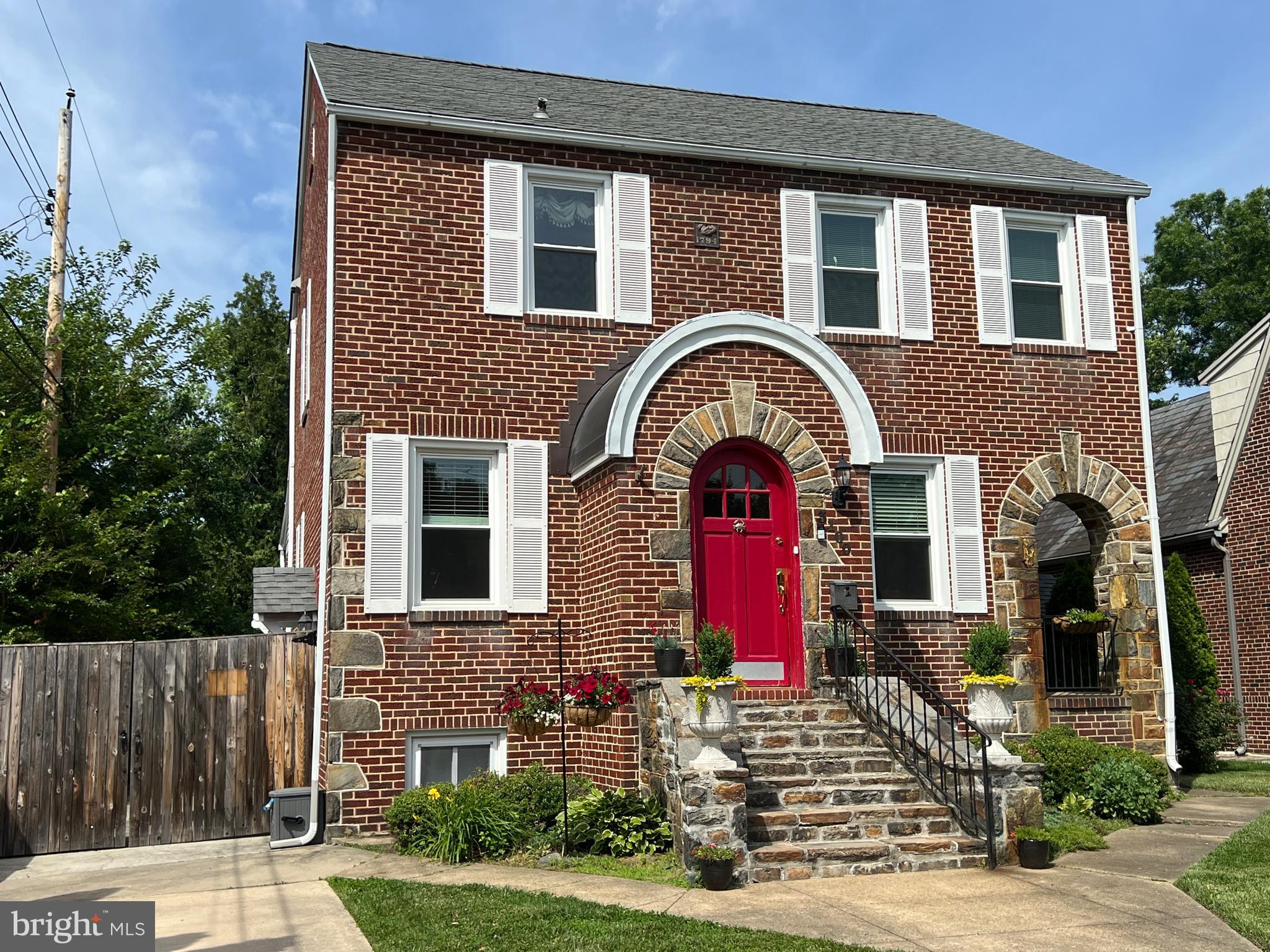 OPEN HOUSE, SUN, 5/7/26, 1 TO 3 PM! This stately,  3 BR, 2.5 BA brick colonial is at once updated AND laden with character throughout! Oak hardwood floors abound, along with period-correct, natural wood grained doors and stained glass. The kitchen has been updated with a large island, granite counters and stainless steel appliances. On the first upper level, all of the bedrooms have even more oak flooring! Check out the gorgeous hallway bathroom with the update, basket-weave tile and the absolutely timeless, marble subway tiling details. The primary bedroom has a true primary bathroom as well! The second upper level third bedroom is super large and can work well as a spacious guest suite or as a large primary bedroom. The basement is fully finished and has plenty of space to create an additional bedroom, if needed. There's a convenient half bathroom in the laundry room, too. The fully fenced and completely usable, flat backyard is terrific for pets, play, and guests, all of which are made better with the supreme privacy! Sellers have added an awesome screened-in back porch, a perfect three season room that will keep the mosquitoes from bothering you in the summer! Located close to Herring run Park and Lake Montebello, two of the gems in 21214. Want some of the best crabcakes in Maryland? This house is close to Koco's, a restaurant that will give any other crabcake place a hard run for the money!