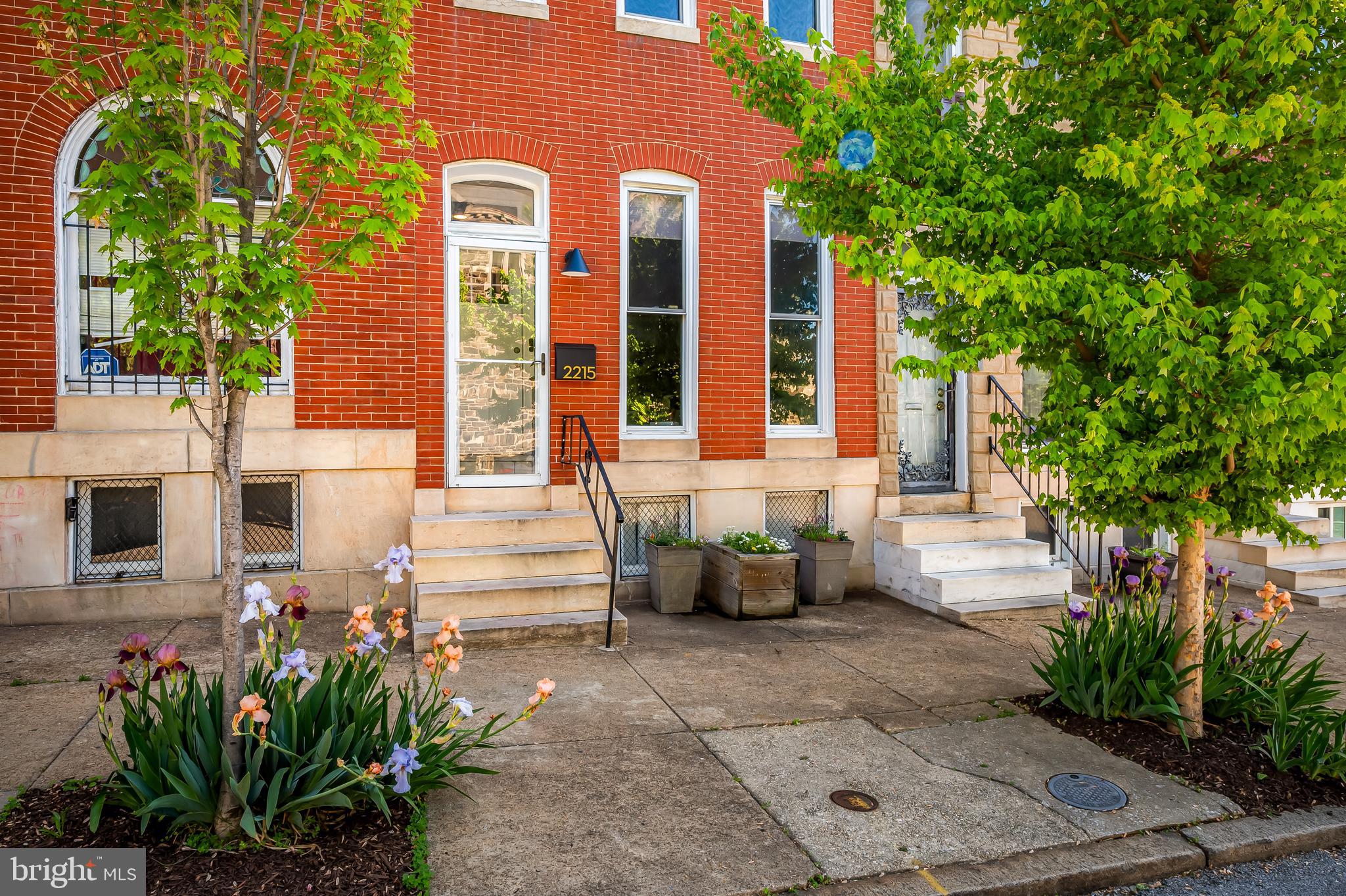 Create the life you love in this sun-drenched, thoughtfully designed home in Reservoir Hill—where historic charm meets modern ease. Step inside to discover a space that feels fresh, open, and effortlessly stylish. The main level offers a flowing eat-in kitchen and dining area, perfect for gathering with friends or creating your next culinary masterpiece. A first-floor powder room adds convenience without sacrificing design. Upstairs, the second level features two spacious bedrooms and a beautifully updated hall bath—ideal for guests, work-from-home flexibility, or growing households. The third floor is your personal retreat: a private primary suite complete with a serene bedroom, walk-in closet, and elegant en-suite bath.
Natural light pours into every room, creating a bright, uplifting atmosphere that feels both warm and modern. Throughout the home, you'll find refined historic details—including original handrails and graceful staircase, and vintage fireplace mantels that ground the space with timeless character. The unfinished basement offers practical storage and future potential, while the fully fenced courtyard garden invites you to unwind, entertain, or let your pets roam freely. Enjoy easy access to Druid Hill Park for outdoor activities and connection with world class greenspaces, the Baltimore Zoo and The Rawlings Conservatory. Close to Bolton Hill and Mount Vernon where you can indulge in your desire for films, cafes, restaurants, concerts and museums. With its blend of historic soul and modern comfort, this Reservoir Hill gem is more than a home—it’s a canvas for your next chapter.