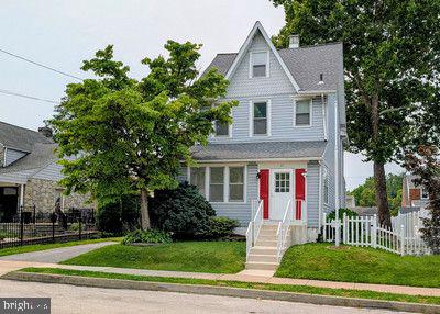 Welcome to 611Rutledge Ave! This Colonial-style residence, built in 1919, seamlessly blends timeless charm with modern comforts, offering an exceptional lifestyle in a serene setting of the Folsom Section of Ridley Township. Spanning 2,272 square feet, this home features a welcoming enclosed front porch, four spacious bedrooms and two full bathrooms, providing ample space for relaxation and entertainment. Step inside to discover a warm and inviting interior adorned with elegant wood floors and traditional architectural details. The thoughtfully designed floor plan enhances the flow of natural light, creating a welcoming atmosphere throughout. Recessed lighting and ceiling fans add a touch of sophistication and style. The formal dining room is perfect for hosting gatherings, while the cozy living spaces invite you to unwind after a long day. The basement is freshly painted and has a laundry area with brand new washer and dryer. Venture outside to find a large well maintained deck overlooking a beautifully landscaped lot, measuring 0.11 acres, featuring a private rear yard and charming front yard that enhance the home's curb appeal. The outdoor space is perfect for summer barbecues or quiet evenings on the deck, where you can enjoy the tranquility of your surroundings. A shed shop provides additional storage or a creative workspace, catering to your hobbies and interests. The exterior of the home is clad in durable vinyl siding, ensuring low maintenance while maintaining its classic aesthetic. Sidewalks invite leisurely strolls through the neighborhood, while the driveway offers convenient parking. Located within a short distance to public transportation options, including a commuter rail station and an airport less than 10 miles away, this property combines convenience with a peaceful residential atmosphere. This home is not just a place to live; it's a lifestyle choice that offers comfort, elegance, and a sense of community. Experience the perfect blend of historic charm and modern amenities in this exceptional property, where every detail has been thoughtfully curated for your enjoyment.