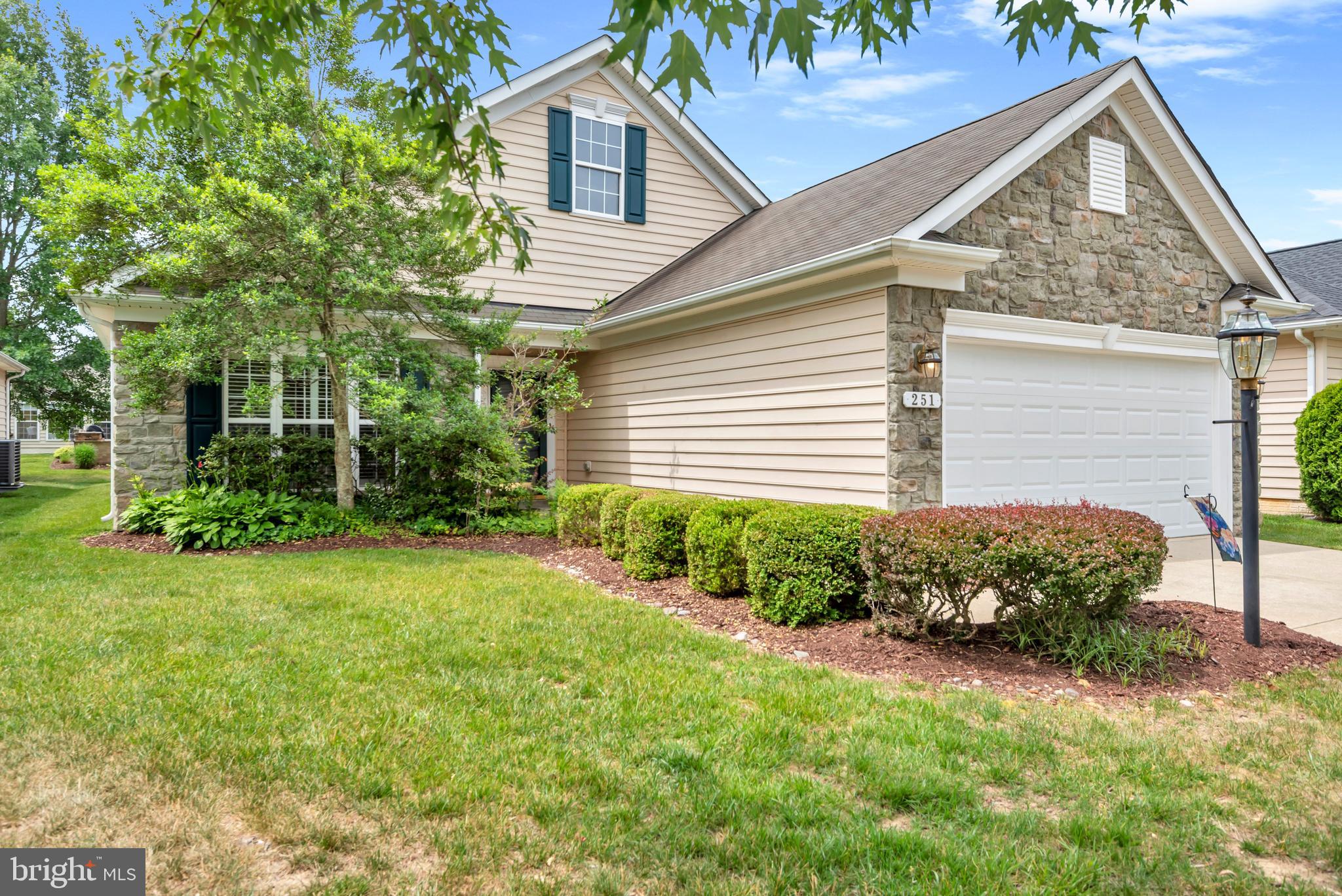 Nestled in the award-winning Symphony Village Active Adult 55+ community, this beautifully maintained contemporary home offers the perfect balance of comfort, functionality, and space for both everyday living and entertaining.
Designed for convenient main-level living, this move-in ready home features a spacious primary suite with dual walk-in closets and an en-suite bath complete with a soaking tub. A second bedroom, full bath, and versatile den/library provide ample space for guests or hobbies. The thoughtfully designed floor plan also includes a formal living room, dining room, laundry room with utility sink, and dedicated office/workstation area.
At the heart of the home, the eat-in kitchen also offers bar seating and opens seamlessly to the inviting family room with a cozy gas fireplace, creating an ideal gathering space. 
Step outside to enjoy exceptional outdoor living beneath a motorized retractable awning overlooking a beautifully designed, lighted 11x39 paver patio—perfect for dining al fresco, entertaining friends, or simply relaxing in a peaceful setting. The attached two-car garage includes an additional refrigerator and storage closet. Recent updates include a newer HVAC system for added peace of mind.
Residents of Symphony Village enjoy an impressive array of resort-style amenities, including indoor and outdoor swimming pools, a fitness center, clubhouse, game room, tennis and pickleball courts, bocce courts, a putting green, scenic walking trails, picnic areas, and a vibrant calendar of social activities, clubs, classes, and community events.
Ideally located just minutes from downtown Centreville, you'll enjoy easy access to local restaurants, waterfront recreation and boating on the Chesapeake Bay, as well as nearby Chestertown, Easton, and Annapolis. Maryland and Delaware beaches are also within a convenient drive, making this an exceptional place to call home.