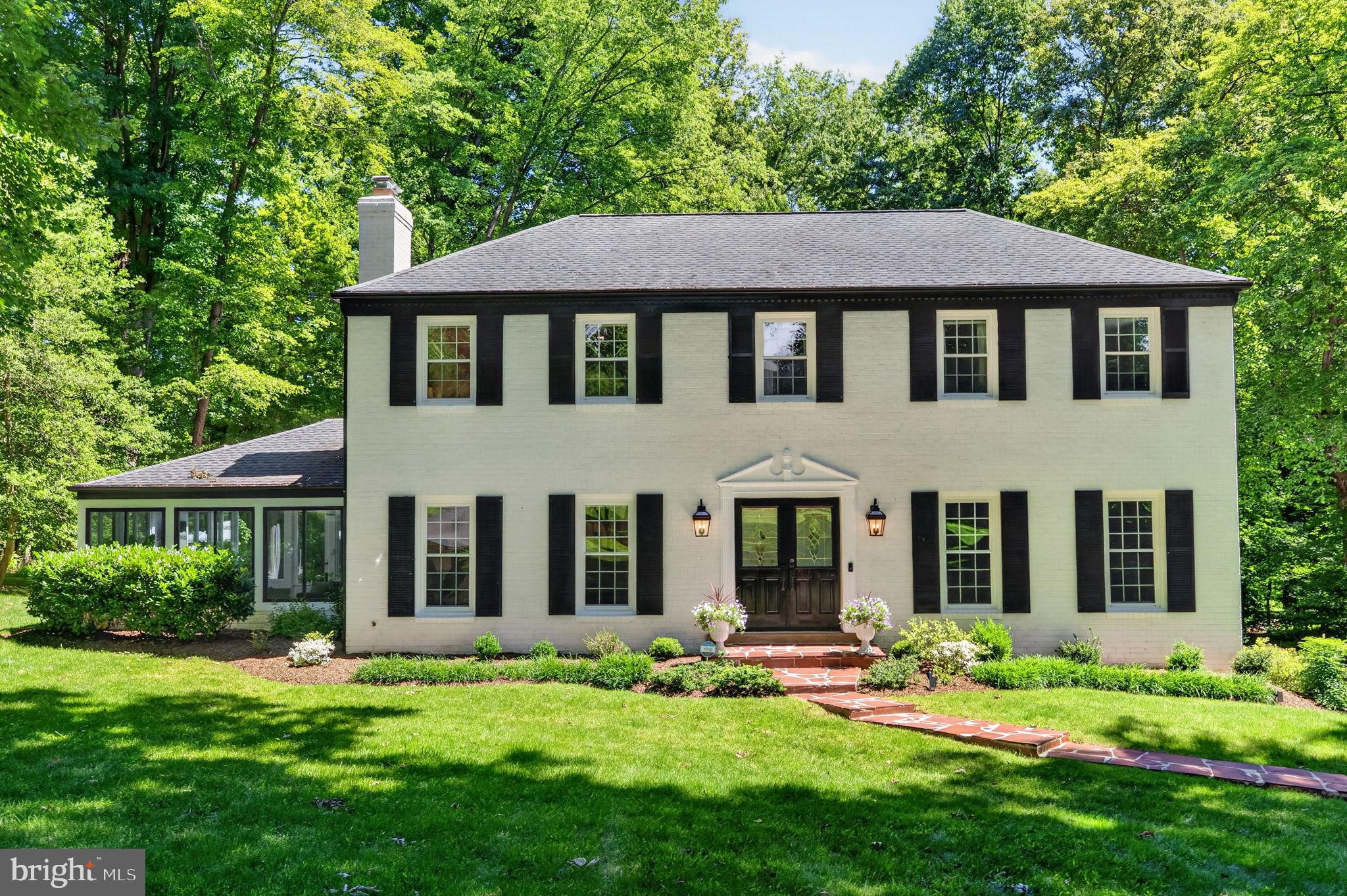 Welcome to this absolutely stunning colonial home in sought after Oakton! This home has been completely renovated and sits on a 1 Acre lot -- a true gem. On the main level, you'll find the most cozy living room with a fireplace, flanked by beautiful built in bookshelves. The open kitchen has quartz countertops, updated cabinets, updated light fixtures, Kitchen Aid range, Bosch dishwasher, and the most charming coffee nook and breakfast bar. Off the kitchen you will find a spacious dining room on one side, and an amazing four season sunroom on the other with custom french doors, vaulted ceilings, and it's own dedicated HVAC system. There is an office/additional sitting room on the main level that has been completely color drenched and truly such a vibe. Upstairs you'll find the primary suite with large walk-in closet, it's own linen closet, and completely renovated en-suite bathroom. You'll also find three guest rooms and a shared renovated guest bath. Downstairs is complete with a fully finished basement, laundry, and a large finished garage with epoxy floors -- can be used for gym space, extra rec space, or to park two cars. The backyard is absolutely amazing -- a flagstone patio is off of the sunroom that leads to tons of green space with the potential to do anything you want! There is no HOA, so the world is your oyster in the back! Full upgrades list in documents section -- Roof (2019), HVAC (2020), Water Heater (2020), Dishwasher (2025), Other Appliances mostly 2021 - 2025, Paint (2026), Basement Steps + Primary Closet Carpet .. only locations w/ carpet (2026).