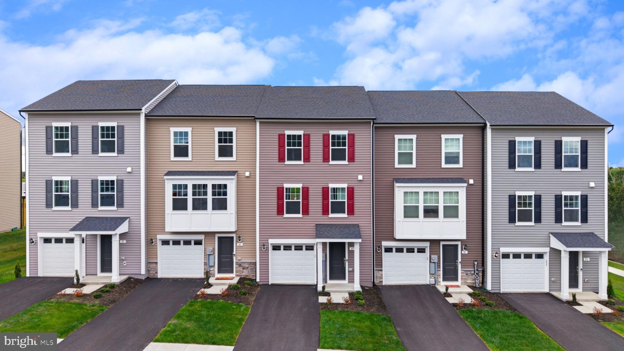 IMMEDIATE MOVE-IN – LIMITED-TIME INCENTIVE!* NOW OFFERING UP TO $10,000 IN CLOSING COST ASSISTANCE FOR PRIMARY RESIDENCE WITH USE OF APPROVED LENDER AND TITLE** Experience one of the best values per square foot in Inwood, WV with this move-in ready, brand-new townhome in South Brook. This home showcases stunning mountain views paired with a bright, designer-inspired interior—featuring white cabinetry, white quartz countertops, and a crisp white backsplash for a clean, modern aesthetic buyers love. Enjoy spacious, open-concept living with the largest townhome floorplan in the community, designed for both everyday comfort and entertaining. All of this in a prime location just minutes from downtown Martinsburg, with quick access to shopping, dining, and I-81 for an easy commute. Low-maintenance living, high-end finishes, and immediate availability—this is a rare opportunity you don’t want to miss. Schedule your tour today before this April incentive is gone!
