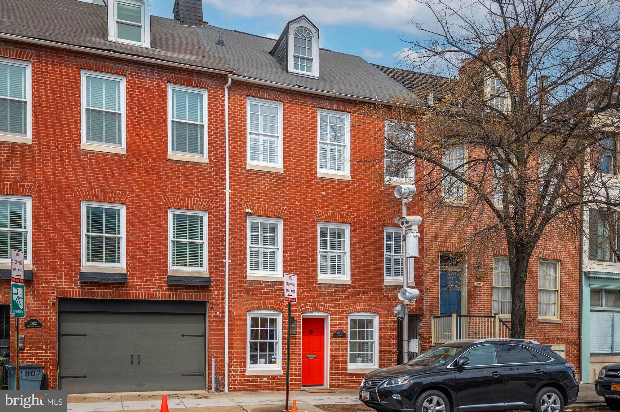 Welcome to 1904 Aliceanna St, your own piece of Historic Fells Point, a unique 20 ft. wide townhouse with incredible features and attention to detail. The first floor welcomes you with a cozy sitting room leading you into your own urban oasis - a green yard perfect for family gatherings and entertainment. Second floor is the entertainment level, boasting a large fully renovated kitchen with matte black wood cabinets, European reclaimed wood floating shelves, a timeless subway backsplash and the hottest honed marble countertop. It also features an inviting living room with exposed original brick fireplace mantle, a half bath, and a walk out deck leading to your backyard. 

Third floor is a perfect design with two sun-filled bedrooms, plentiful closets and a large dual entry bathroom with a jetted tub, exposed brick and timeless pedestal sinks, fitting for the age of the house and is charm.

Third floor is a suite with a large bedroom with vaulted ceilings, exposed beams and a spacious bathroom with a walk-in shower. 

Conveniently located in Baltimore's historic district of Fells Point,  walking distance to waterfront, all the trendy restaurants and shops, as well as in close proximity to Harbor East, Canton and major highways. TWO assigned rented parking spots are just steps from the front door for your stress-free living.