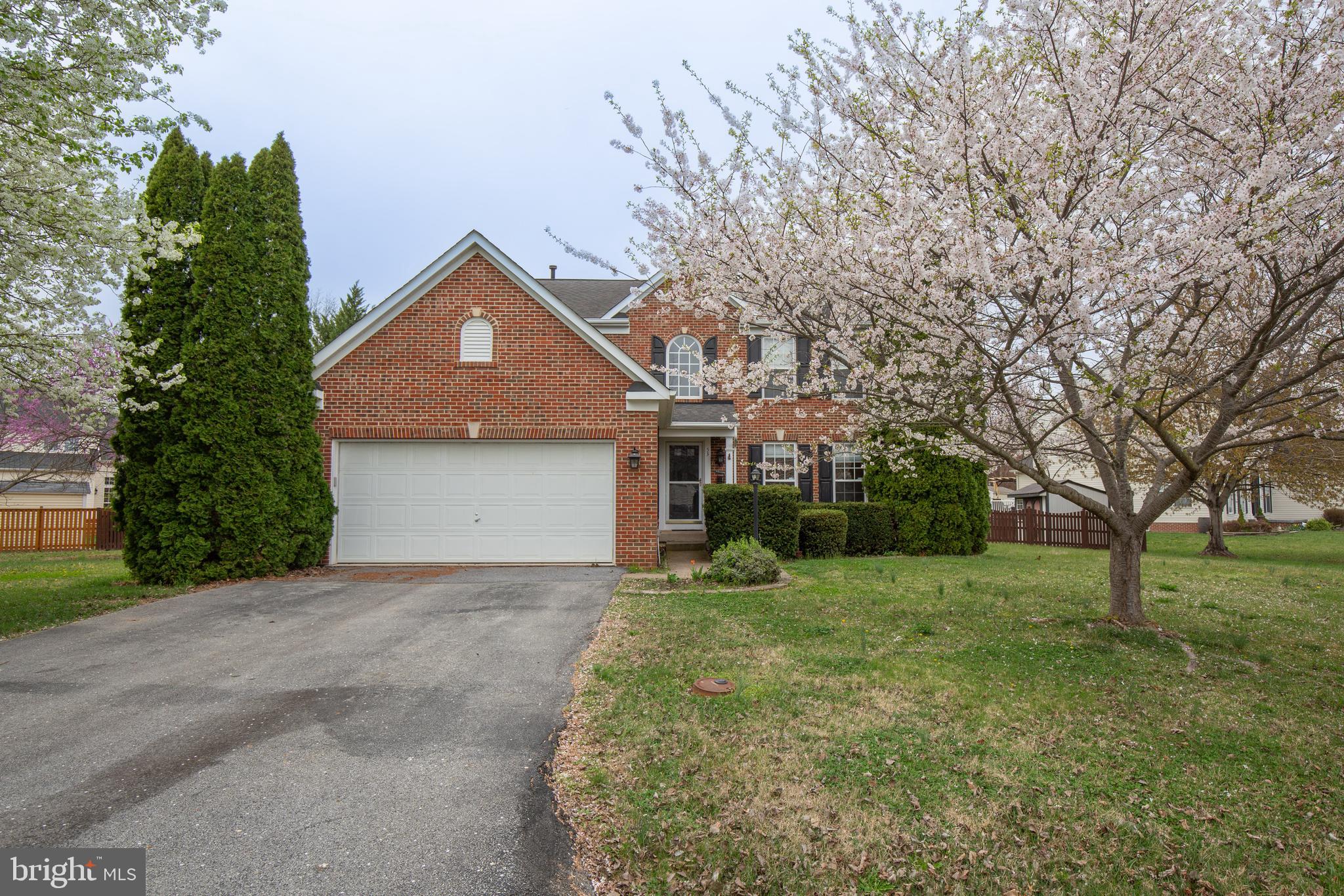 This large single family home is located in the golf course community of Locust Hill in Charles Town, WV!

You are welcomed into this beautiful home through a bright, grand entry - with hardwood floors that flow throughout the spacious eat-in kitchen with large island, stainless steel appliances, plenty of counterspace; and sliding doors that access the rear deck and fenced yard - the perfect space for entertaining! The main level also has a separate dining room, living room, family room off of the kitchen (all carpeted) with gas fireplace, laundry room with 2 car garage with 220v outlet access, and a half bath.

The carpeted upper level includes the generous primary suite with jetted tub, separate shower, walk-in closet, and vaulted ceiling; as well as 3 additional bedrooms and full bath. 
 
The open finished walk-up basement has an additional room with built-in shelves with full bath, and tiled storage area. 

Locust Hill Community is conveniently located 15 minutes from US-340, and 30 minutes from both Winchester and Martinsburg - perfect for commuters!
Pets are on a case-by-case basis.

Additional monthly costs include Renter's insurance (price based on plan selection) and Second Nature Air Filter Subscription program ($15.00/ month).
