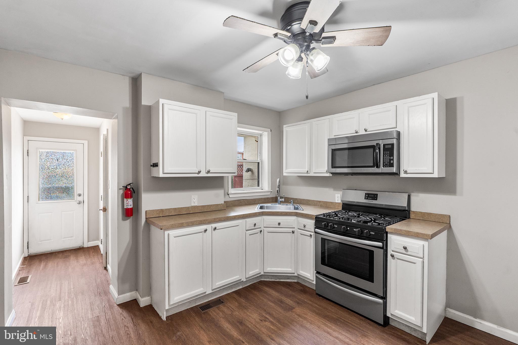 Eddystone borough townhouse, originally built in 1920 and thoughtfully renovated in 2019 and new AC unit in 2026, offers a perfect blend of historic elegance and modern luxury.  752 square feet of living space including 2 bedrooms and 1 bathroom with washer and dryer in the basement. The kitchen is equipped with stainless steel appliances, including an oven/range with gas cooktop and built-in microwave, ensuring that culinary adventures are enjoyable. The sleek design is complemented by ample cabinetry, providing both style and functionality.  Natural light flows through the home, enhancing the inviting ambiance. Multiple parking options-including driveway, off-street, and alley access-ensure convenience for you and your guests. The partial basement provides additional storage solutions with access to HVAC furnace.  With its prime location, this townhouse is a rare find that promises a convenient living experience.