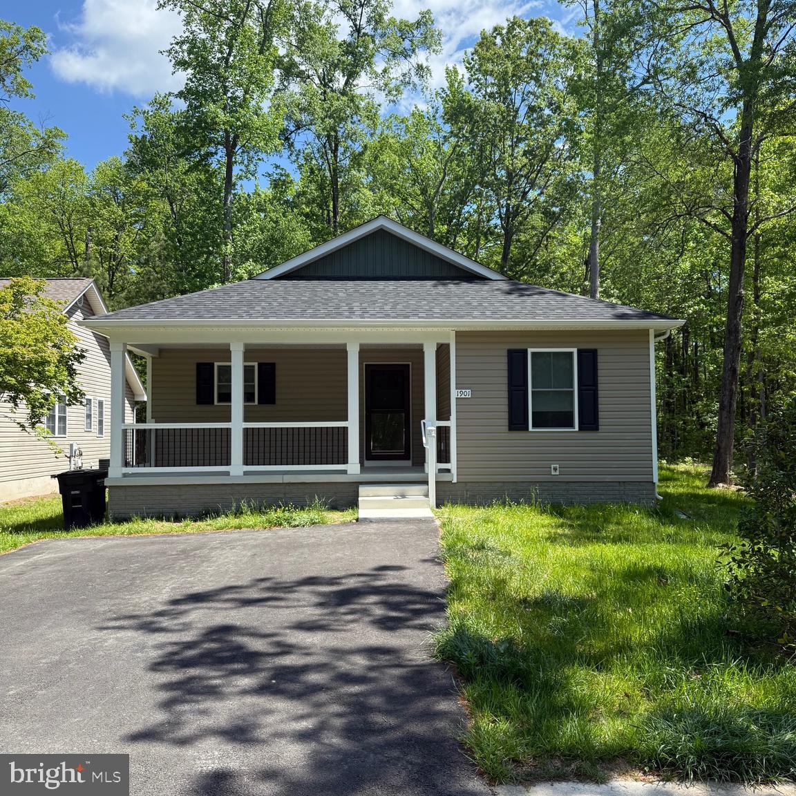 This newer 3-bedroom, 2-bath home offers easy, low-maintenance living in the heart of Colonial Beach. Enjoy a spacious open floor plan all on one level, featuring hard surface flooring in the main living areas and baths, cozy carpeted bedrooms, and stylish finishes throughout. The kitchen includes stainless steel appliances, solid-surface countertops, and contemporary cabinetry in both the kitchen and bathrooms.

Relax on the covered front porch or unwind on the screened rear deck overlooking the backyard. Additional highlights include an asphalt driveway, a conditioned crawl space, and concrete foundation walls for added energy efficiency. Located just a quick golf cart ride from the sandy beach, shops, restaurants, and marinas—this is your chance to enjoy life in a charming beach town along the Potomac River!