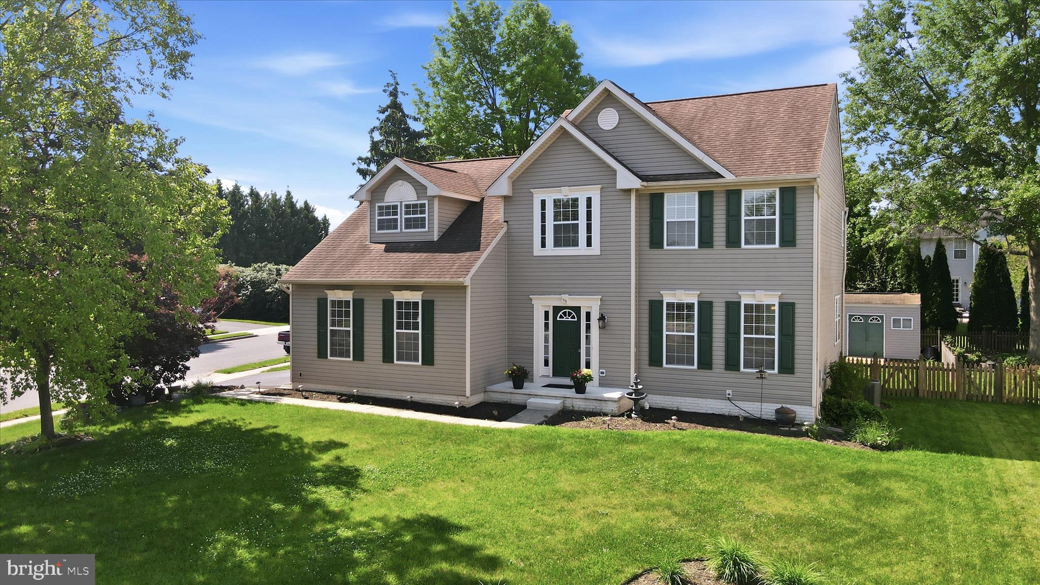 Located in the sought-after North Crossing community, this home offers a harmonious blend of luxury and comfort.  Features include four spacious bedrooms, as well as laundry facilities on the upper level.  The primary bedroom includes a walk-in closet and adjacent full bath which boasts of a soaking tub and separate shower, and a unique open hallway area overlooks the family room below. The well-appointed kitchen, complete with stainless steel appliances, ceramic tile floors and a central island seamlessly flows into the breakfast area and adjoining family room (with luxury vinyl plank flooring) where you can enjoy cozy evenings by the fireplace. The main level additionally features dining and living rooms with luxury vinyl plank flooring and crown molding, as well as nine-foot ceilings. On the lower level, you will enjoy the large recreation room which has a double wide areaway leading up to the back yard.  Also, downstairs, there is a bathroom, den/study/craft room and storage area. The exterior is equally impressive, situated on a desirable corner lot with tasteful landscaping and a level yard, ideal for outdoor gatherings. In addition, a spacious multi-level deck invites you to unwind while sitting under the gazebo.  Additional highlights include stainless steel appliances, a two-car side-entry garage with lots of shelving/storage, and shed in fenced backyard.  HOA fee includes pool access, tot lots, common areas and park.  Close to shopping, restaurants, commuter routes and many area landmarks.