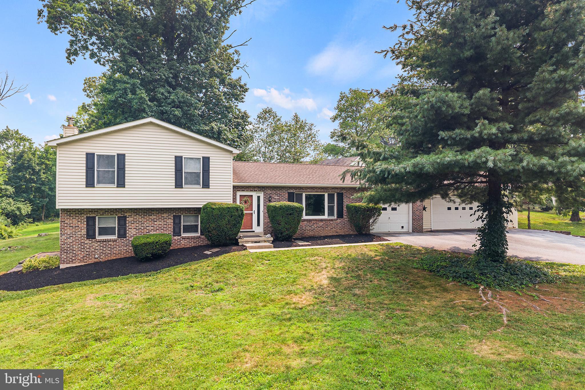 Welcome to 2604 Pheasant Run Lane, nestled on a private 1.2-acre cul-de-sac lot in East Pikeland Township within the sought-after Phoenixville Area School District. From the moment you arrive, you'll appreciate the extended driveway, offering ample parking for family and guests. Surrounded by mature trees, the wooded setting provides both privacy and plenty of space to enjoy the outdoors. Exterior improvements include a new roof (2020), fencing (2015), and a beautiful paver patio added in 2018/2019.

Step inside to a welcoming foyer with a convenient coat closet. To the right, the spacious dining room offers plenty of room for entertaining and flows seamlessly into the beautifully renovated kitchen. Featuring soft-close cabinetry and drawers, gas cooking, a breakfast area, and a peninsula with additional counter space and storage, this kitchen is designed for both everyday living and hosting. Just off the kitchen is a versatile wet bar/mudroom area that adds even more storage and functionality. Sliding glass doors lead to the fenced backyard, complete with a deck and paver patio—perfect for outdoor dining, entertaining, or simply relaxing.

Upstairs, you'll find two generously sized secondary bedrooms, each with its own closet and ceiling fan/light fixture. The first guest bedroom was updated in 2021 with fresh paint, decorative wainscoting, and refreshed closets. The second guest bedroom received fresh paint and updated trim in 2023. A renovated full hall bathroom (2018) and convenient hall linen closet add to the home's thoughtful layout. The owner's suite was freshly painted in 2024 and features two closets along with a private en-suite bathroom, renovated in 2017, complete with a walk-in shower.

The lower level features a spacious family room centered around a functioning coal/wood stove that was professionally cleaned in 2015 and has only been used a few times, making it the perfect spot to gather on chilly evenings. A nearby room serves as the fourth bedroom, complete with a closet, laminate flooring, and a newer exterior door (2022) providing direct access to the backyard and paver patio—ideal for guests, an in-law suite, or a home office. The generously sized laundry room includes a utility sink and offers potential for a future folding station or even a half bathroom.

The unfinished basement provides abundant storage and excellent potential for future finished living space.

Additional updates provide peace of mind, including a propane heater (2015), AC condenser (2015), well pressure tank (2021), and electric hot water heater elements and anode rod replaced in 2021. The stove includes the original owner's paperwork, offering added value for the next homeowner.

Set on a picturesque, tree-lined 1.2-acre lot with room to roam, this home combines privacy, space, and convenience in a desirable cul-de-sac location. With numerous updates already completed and plenty of opportunities to make it your own, this property is ready to welcome its next owners. Schedule your private tour today!