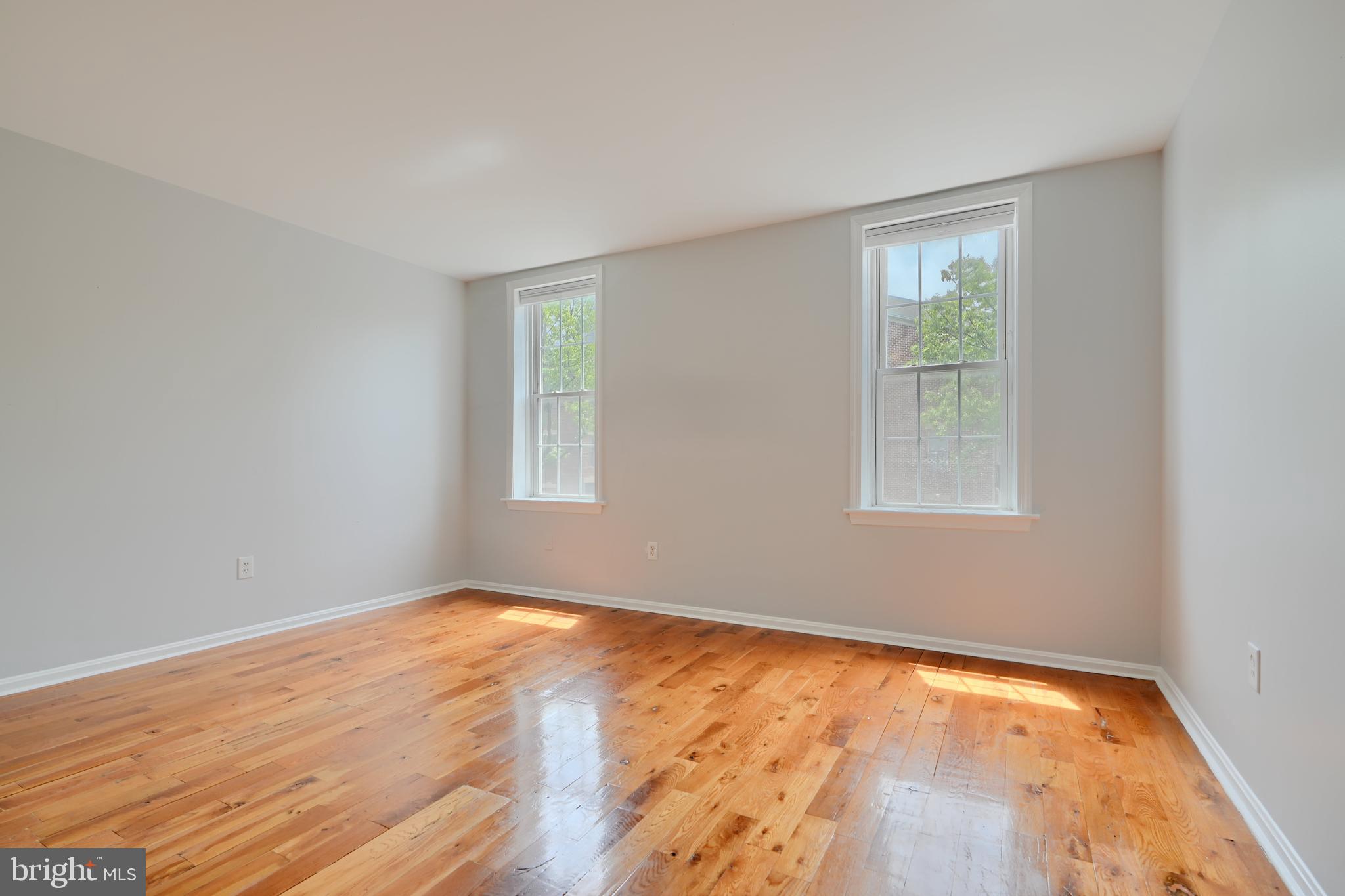 Phenomenal location between fells and Canton just a stones throw to the waterfront.   2 Bed one bath apartment with water views from living room windows.  Convenient kitchen with table space, separate living room.  Upstairs find large main bedroom, 2nd bedroom perfect for home office, and full bath.   Convenient to JHH, all the local shops and restaurants, 95 & 895