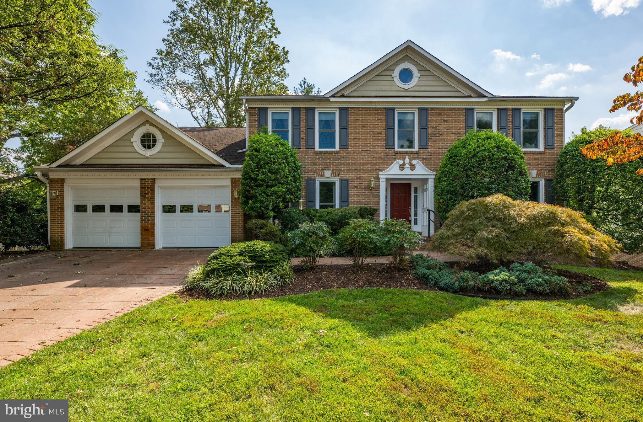 Welcome to 10904 Sugarbush Terrace, a 5BR/4.5BA center hall colonial style home located in the sought after Timberlawn neighborhood. Upon entering the foyer, you immediately notice the double height, vaulted ceiling with a centered wood-burning fireplace. The room is filled with tons of natural light via the skylights above. The main level includes a large formal dining room perfect for entertaining, a wet bar area with glass front solid cherry cabinets. The kitchen has a large center island, granite countertops, 2 sinks, 2 dishwashers, double wall ovens, gas range with hood above, under cabinet lighting, solid cherry custom cabinetry offering ample storage and a breakfast area. Just off the kitchen and visible from the sink is a three-season room, perfect for a play area. The main level also offers a large study / home office with a full wall of built-in cabinets and shelving above, powder room, formal living room, a mud room/large laundry room with utility sink and extra cabinet space, plus access to the attached two car garage, which also houses additional cabinets and an extra refrigerator. The second level offers 4 spacious bedrooms and 3 full baths - including the primary suite with vaulted ceiling, walk-in closet and a luxurious bathroom that was fully renovated in 2020. This primary bathroom has all the bells and whistles - a freestanding soaking tub, high-end Kohler fixtures, heated porcelain floors, a walk-in glass door shower with bench seating and three separate showerheads, Caesarstone double vanity and slide up Robern uplift cabinets and recessed lighting, and walnut cabinetry. The walk-out lower level is completely finished and has a fifth bedroom and fourth full bath, as well as a rec room with a bar, a large multipurpose room, and an office. The rear Trek deck, built this year and has tons of hidden storage underneath accessible via lockable doors. Additional features include Pella doors and windows installed in 2012 (windows in the kitchen and breakfast area have interior blinds), a 75-gallon water heater, hardwired smoke and CO2 detectors, central vac system, and a SimpliSafe security system. The home has access to the Penbrooke Community Association via fees and use of their pool and tennis courts. The house is about 1 mile from the Grosvenor / Strathmore Metro Station.