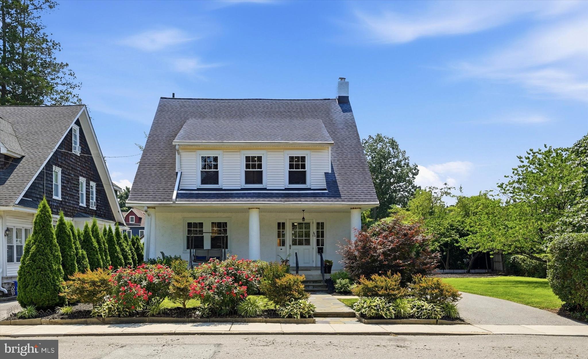 Welcome to 208 Sabine Avenue. Meticulously maintained and set on a spacious 0.20-acre lot along a picturesque tree-lined street, this charming home offers the perfect blend of timeless character, modern comfort, and an unbeatable location in the heart of Narberth Borough. From the moment you arrive, you'll appreciate the beautifully manicured landscaping and inviting covered front porch. Inside, handsome inlaid hardwood floors extend throughout the sun-filled Living Room and Dining Room. The sizable Living Room is centered around a classic brick gas fireplace, flanked by custom built-ins that provide both storage and display space, while a convenient coat closet adds to daily functionality. The Dining Room is filled with natural light and overlooks the front gardens, creating an inviting setting for everyday meals or entertaining. Just beyond, the Kitchen offers ample cabinet and counter space and is equipped with new stainless-steel appliances. Adjacent to the Kitchen is a Laundry Room that also serves as a Mudroom, complete with additional storage, and provides direct access to the rear Deck. Featuring a retractable sunshade and a set of stairs to the yard, the Deck is an ideal space for outdoor dining, grilling, or simply enjoying your morning coffee. The Second Floor offers three well-proportioned Bedrooms, each with abundant natural light and ceiling fans, along with a versatile Bonus Room that is perfect for a home office, nursery, or flex space. A Full Hall Bathroom features classic tile, a pedestal sink, and a tub/shower combination. The Third Floor provides a private retreat with the fourth Bedroom, highlighted by a skylight, and its own Full Bathroom and stall shower. The unfinished Basement, complete with Bilco doors to the backyard, provides excellent storage and additional potential. Outside, the property continues to impress with a detached one-car Garage, a long private driveway, and an expansive side yard offering endless possibilities for gardening, recreation, or future enhancements. Recent improvements include a new HVAC system (2026), new carpeting on the 2nd & 3rd floors (2025), recessed lighting throughout the 1st & 2nd floors (2025), new kitchen appliances (2025), and numerous additional updates that make this home truly move-in ready. Located just blocks from downtown Narberth and the SEPTA Regional Rail station, this property offers easy access to local shops/restaurants, parks, major roadways, as well as Wynnewood, Ardmore, and Center City Philadelphia. Here you’ll be able to enjoy the perfect balance of walkability, suburban charm, and everyday convenience!