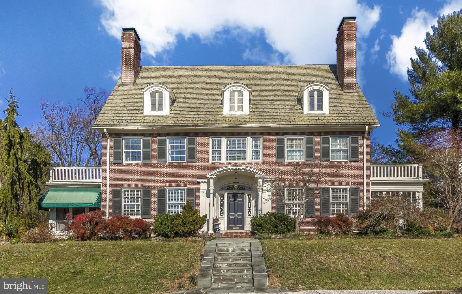 The quintessential Guilford home! Elegant all brick 6+ Bedroom, 4/2 Bath Colonial home on a double lot totaling 1.03 acres. Beautifully updated including extensive custom lighting. Gracious center hall with classic low-rise staircase and beautiful glass double pocket doors to formal Living Room with fireplace, formal Dining Room with decorative fireplace and Family Room with fireplace. Gourmet Kitchen with marble counters, stainless steel appliances, large sunny breakfast area and adjoining Butler's Pantry. A powder room, glass enclosed porch and large screened porch complete the main level.  A sumptuous Primary Suite includes a custom fitted Dressing Room, spa Bath and Half-bath plus 2 additional Bedrooms, shared Bath and large Hall seating area comprise the 2nd level. 3 Bedrooms, Hall Bath, Game Room and Study/Guest Room are found on the 3rd floor. Lower level Home Office/Bonus Room, Exercise Room, Wine Room and Laundry Room. Wisteria pergola covered Deck leads to a hot tub deck and flagstone patio. Matching detached 2-car Garage. All on a beautiful landscaped lot. All offers will be presented in the order received.