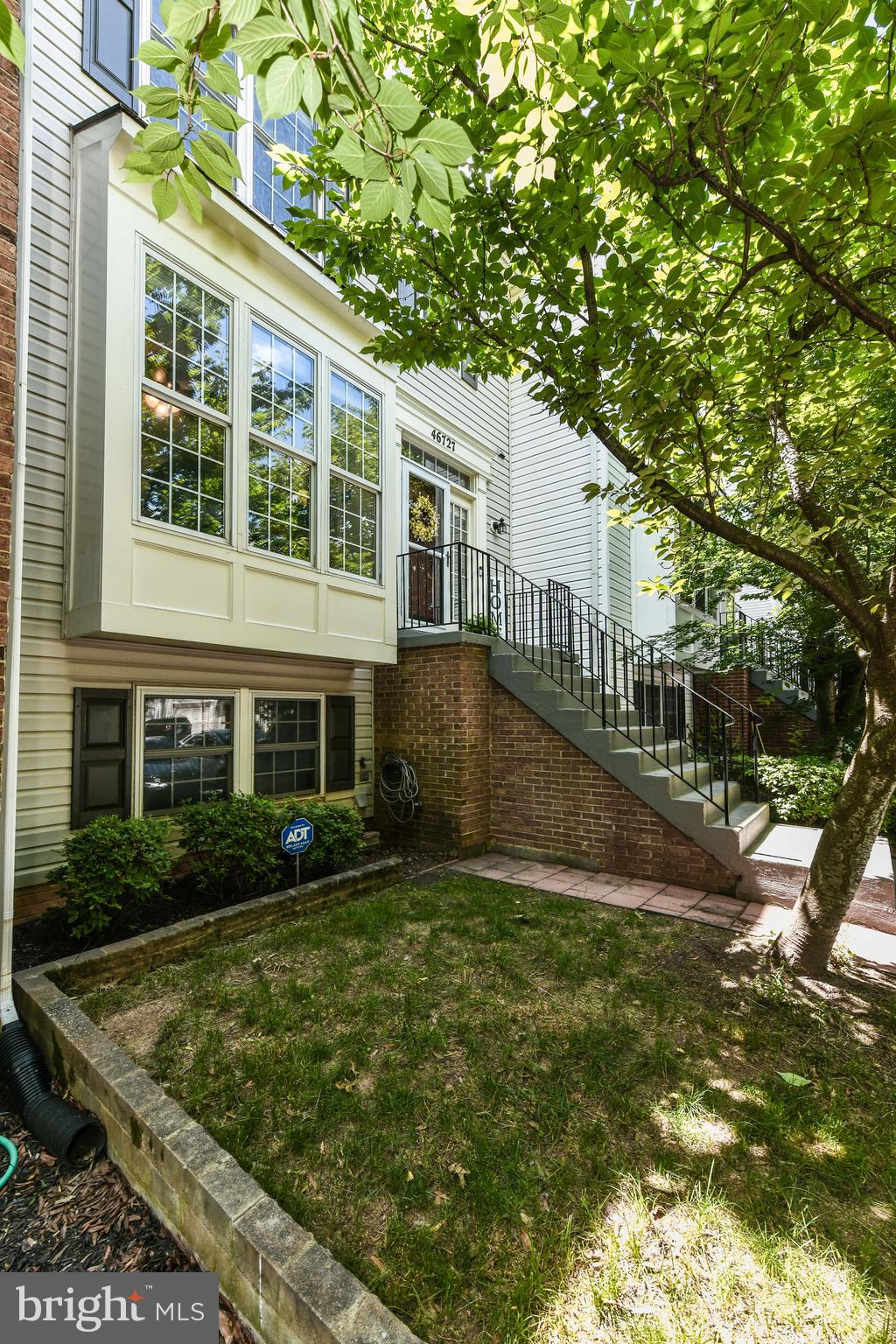 Updated 4BR, 3.5BA TH with 3 level bumpout in sought after Cascades/Potomac Lakes Community! Enter into welcoming front door with ample windows throughout main level allowing lots of natural sunlight, cherry hardwood floors & neutral paint tones*Kitchen is bright & light with bay window bumpout, ample white cabinetry, granite counters & stainless steel appliances*Dining room features chair rail & crown molding with step down to living room featuring sliding glass doors leading to deck & another set of french glass doors leading to family room*Cozy family room features cathedral ceilings, decorative-only fireplace & additional set of sliding glass doors to deck*Lower level is fully finished & features rec rom, built-ins perfect for office space, full bathroom & doors leading to patio & private, fenced backyard*Primary bedroom features cathedral ceilings, ceiling fan, walk in closet & updated en suite bathroom*Deck overlooks fenced in yard*Enjoy the many amenities of the Cascades Community Association including 5 swimming pools, 13 tennis courts, exercise rooms, community center, trails and more*It's minutes to the library, shopping, restaurants & farmer's market*The Potomac river, golf course & boat ramp are close by*A true commuter's dream location - within minutes of Dulles Airport, RT7, RT28 tollway, Reston Metro & Dulles tech corridor*Five minute walk to Silver Line bus connection*