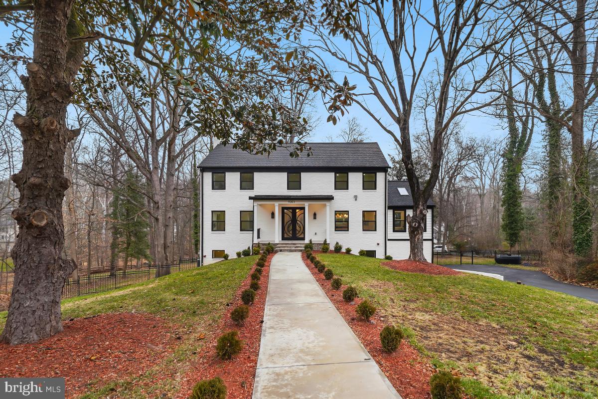 A truly exceptional, fully reimagined 5BR/3.5BA estate offering the look and feel of bespoke new construction. Greeted by grand custom iron double front doors, this home is privately tucked at the end of a quiet cul-de-sac just off Bradley Blvd in the heart of Potomac on a rare ¾-acre lot. Inside, enjoy a magazine-worthy chef’s kitchen featuring quartz waterfall countertops, premium Thor appliances, and custom cabinetry throughout. The expansive open-concept layout flows into a sunroom with dramatic cathedral ceilings. Every bathroom has been completely custom redesigned with high-end finishes. Additional highlights include a 2-car garage with EV charger and seamless access to a modern Trex deck with sleek designer metal railings—perfect for entertaining. Minutes from top-rated Potomac schools, Potomac Village, and major commuter routes to DC, Northern Virginia, and Bethesda.