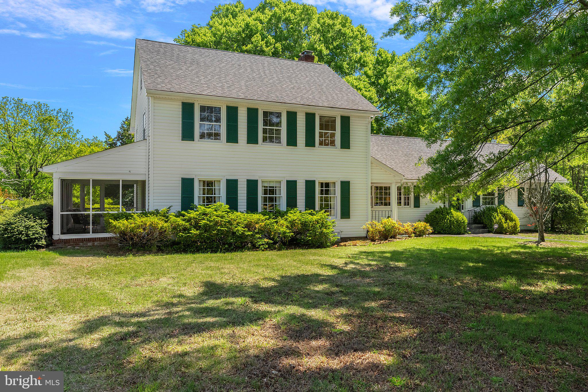 This Gorgeous Family Estate w/ breathtaking acreage is being offered for the 1st time ever! This one of a kind estate features a total of 265.74 Acres, a stunning main family home &  an adorable bungalow home. This property is extremely private, peaceful & offers beautiful sunsets while overlooking the acreage. Perfect for a multi-generational family as more homes could be added to the land if needed. The land is flat & would be ideal if you wanted to add a barn & pastures for horses!  The main family home features 5 beds, 3.5 baths & is wonderful for entertaining w/ double doors leading from the dining room to the lovely screened-in porch w/ stunning views & a slate patio that is a great gathering spot. The main home boasts beautiful wood/slate flooring, heart of pine walls, built-ins, a lovely fireplace, stunning trim work &  so much more. You can easily increase the sf in the main home by finishing the massive walk up attic & the basement. The 2nd home is an adorable 2 bedroom 1 bath almost 1200 SF  bungalow that features SIDING & ROOF that are just over a year old, pine floors, stunning pocket doors & amazing views from the large country front porch & the rear screened porch.