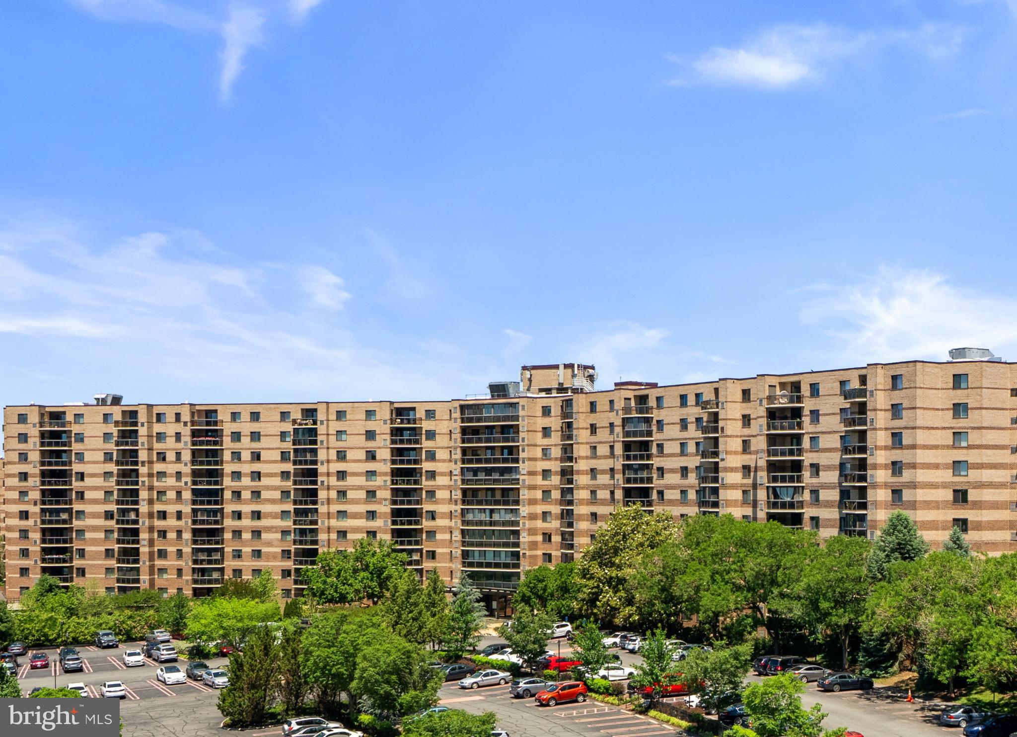 Where else can you find a true 2BR/2BA in Tysons for under $450K? This move-in ready 1,132 SF condo offers fresh paint, new carpet, in-unit laundry, spacious bedrooms with walk-in closets, private baths, and stunning views. Located in the gated Rotonda community with resort-style amenities on 34 acres and just steps from Whole Foods, The Boro, and Metro. Opportunity, location, and value rarely come together at this price point. Schedule your tour before it's gone.                           For more details, read on.                         A 2BR/2BA in Tysons under $450K is an exceptional value! Own this beautiful, spacious, and bright 1,132 SF condo in a secure building with an in-unit washer and dryer and open floor plan. Fresh paint and new carpet throughout. The kitchen offers room for a breakfast table plus wall space for additional cabinetry, and features a new stainless hood, built-in microwave, and wall oven.                       The primary bedroom includes a walk-in closet, two additional closets, and an ensuite bath. The second bedroom also has a walk-in closet and its own full bath. Enjoy sweeping views from both bedrooms and the large balcony.                       The Rotonda is Tysons' hidden gem—34 gated acres filled with amenities including indoor and outdoor pools, a 2,100 SF fitness center, men's and women's spas, game room, and business center. Access many amenities underground during inclement weather. Outdoor enthusiasts will love the green walking trails, ponds, picnic areas with grills, dog park, putting green, tennis courts, basketball court, and sand volleyball court. EV charging stations and car wash facilities add everyday convenience. Enjoy 24/7 security and on-site management.                       The location is hard to beat—directly across from Whole Foods and The Boro, and within walking distance of two Metro stations. Dining, shopping, entertainment, and everyday conveniences are all nearby. Tysons remains Fairfax County's premier business and shopping destination. An opportunity like this doesn't come around often—come see why so many residents love calling The Rotonda home.