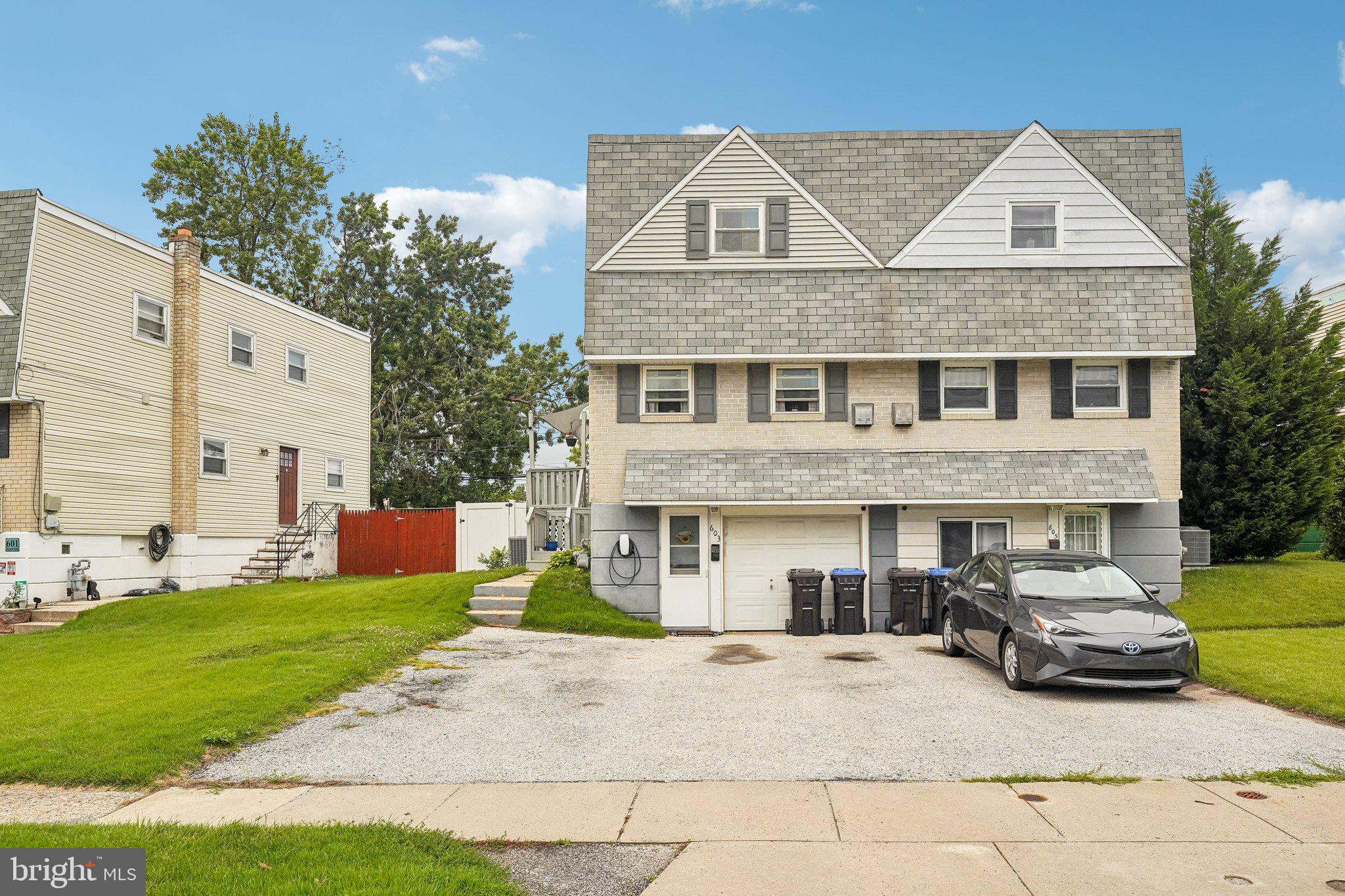 Welcome to this beautifully updated 3-bedroom, 1.5-bath twin home in Norristown, offering modern finishes, thoughtful upgrades, and true move-in-ready living—all with no HOA.

Step inside to an inviting open floor plan where the newly updated kitchen serves as the heart of the home, featuring stainless steel appliances, a center island with stylish pendant lighting, and seamless flow into the main living space. The living room is warm and welcoming, highlighted by an electric fireplace with a stone surround, creating a perfect focal point for relaxing or entertaining.

A charming barn door leads to the half bath and walk-out finished basement, adding both character and functionality to the main level.

Upstairs, you’ll find three comfortable bedrooms and a neutral full bathroom featuring a new skylight that fills the space with natural light. The home also showcases refinished original hardwood floors on the upper hallway, complemented by laminate flooring on the main level and newer carpet in the bedrooms for added comfort.

Outdoor living is a standout feature. Enjoy the newly painted wraparound deck with a shade covering, overlooking a fully fenced backyard. From the lower level, step out to a maintenance-free turf area and paver patio, creating multiple spaces for entertaining, relaxing, or play with minimal upkeep.

Major systems have already been taken care of, with the HVAC and hot water heater replaced in 2023 by the previous owners, offering added peace of mind.

This home is truly turnkey, low-maintenance, and ready for its next owner—just move in and start enjoying it, with the added benefit of no HOA fees or restrictions.