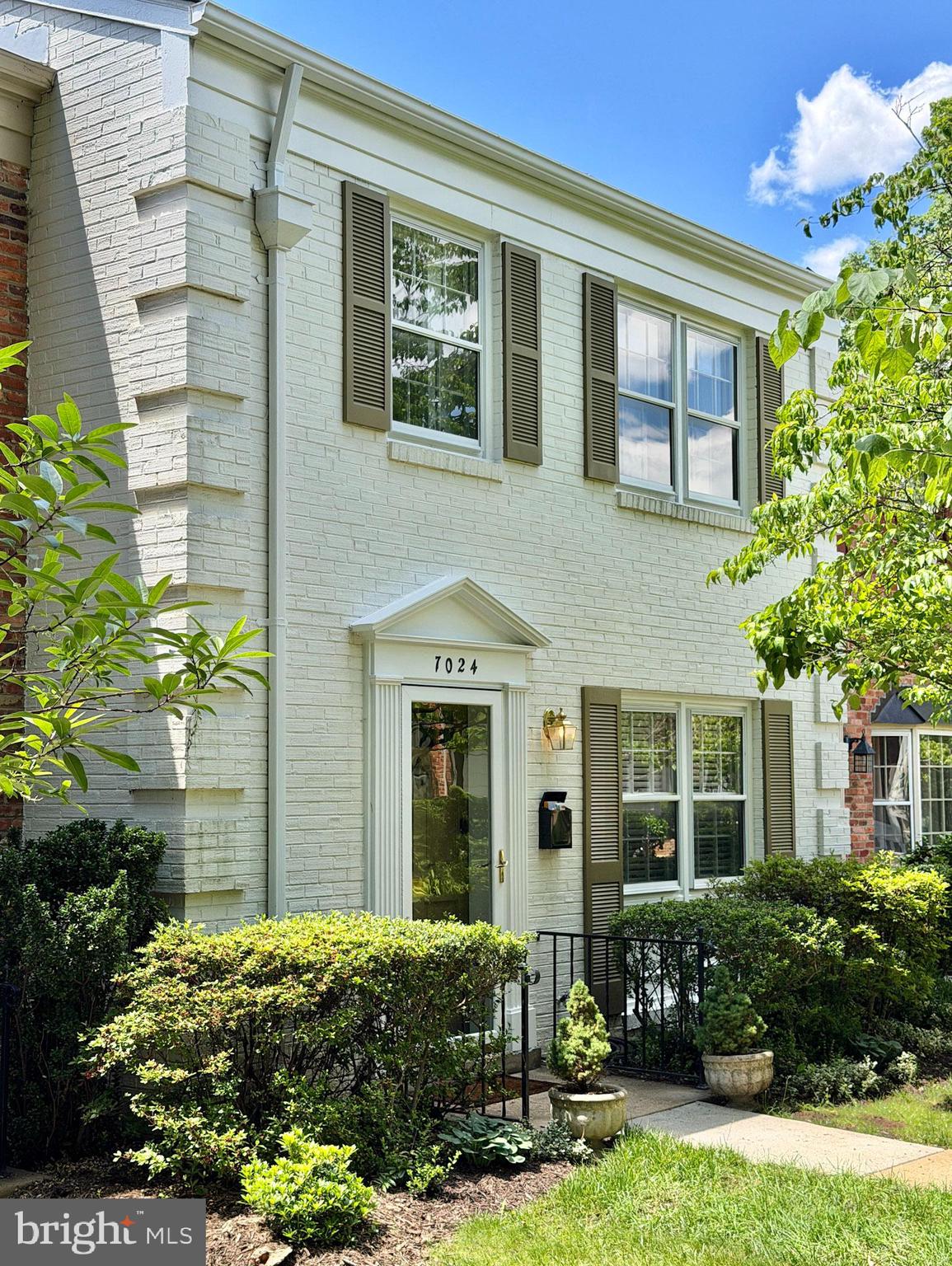 Enter this charming community surrounded by towering oak trees, mature landscaping, and inviting green spaces as you make your way to Alicent Place. Tucked away from the parking area, these homes offer added privacy, with a welcoming private courtyard entrance  and sidewalks leading to your front door . Inside, the entry hall opens to an expansive living room featuring recessed lighting and a seamless flow into the dining area, also enhanced with recessed lights. From here, step out to the private rear yard, complete with a brick patio, privacy fencing on both sides, and a gated brick wall at the rear. Lush landscaping creates a peaceful outdoor retreat perfect for relaxing or entertaining. The beautifully renovated DREAM kitchen is designed to impress, showcasing modern WHITE upper & GRAY lower cabinetry, quartz countertops, a striking waterfall peninsula, and a full quartz backsplash.  Exceptional storage includes a pantry cabinet and a lazy Susan corner cabinet;  both with pull out shelving.  Premium stainless steel appliances, highlighted by a Thermador gas range, microwave and dishwasher, complete the space.  A stylish powder room with a pedestal sink and fixtures finishes the main level.

Upstairs, the spacious primary suite features recessed lighting, a walk-in closet, and a stunning en-suite bath with a walk-in shower. Two additional bedrooms and a second full bathroom with a shower/tub combination, ceramic tile surround, tile flooring, and upgraded fixtures complete the upper level.

The lower level offers a large carpeted family/recreation room with recessed lighting, along with a beautifully renovated powder room. A large utility room includes a full-size washer and dryer plus abundant storage space.

Conveniently located near Lewinsville Park—featuring baseball diamonds, soccer fields, pickleball and tennis courts, playgrounds, and a senior center—this home also offers easy access to shopping, Giant Food, gas stations, coffee shops, and a wide variety of restaurants.  Bustling Tysons Corner, I-66, and I-495 are all just minutes away, and McLean High School is located within blocks.