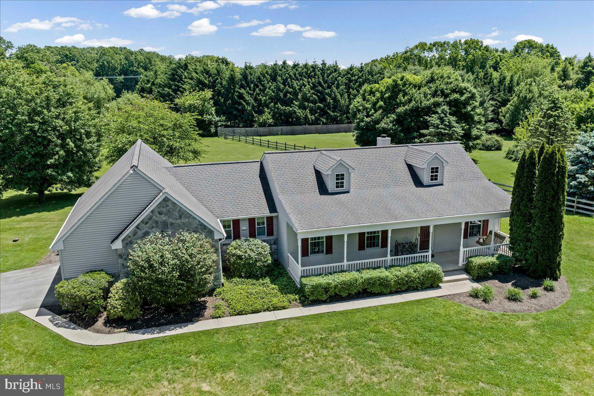Welcome to this beautifully maintained ranch home offering the ease of one-floor living in a convenient Coatesville location. Situated on a meticulously landscaped lot, this move-in-ready residence combines thoughtful updates, generous living space, and exceptional pride of ownership throughout.

From the moment you arrive, you'll appreciate the freshly rebuilt front porch, newly painted shutters, professionally maintained grounds, attached garage, and ample driveway parking. Inside, a bright and inviting floor plan features neutral décor and numerous updates throughout. The spacious eat-in kitchen is highlighted by quartz countertops, abundant cabinetry, stainless steel appliances, and a center island perfect for everyday living and entertaining.

The sun-filled living room offers two Velux skylights with shades and sliding glass door access to the patio, creating seamless indoor-outdoor living. The primary suite features a walk-in closet, private full bath, and skylight that fills the space with natural light. Two additional generously sized bedrooms offer large closets and share a well-appointed hall bath.

The fully finished lower level significantly expands the home's living space, providing endless possibilities for a family room, home office, fitness area, recreation room, or guest accommodations.

Extensive recent improvements provide peace of mind, including a new roof with transferable warranty (2018), Timberline Lifetime shingles, new gutters, downspouts, gutter guards, Pella storm door, newly rebuilt front porch, new heat pump and thermostat, whole-house generator, and security/medical emergency system.

Conveniently located near major commuter routes, shopping, dining, and everyday amenities, this well-cared-for home offers comfort, functionality, and true move-in-ready convenience.
