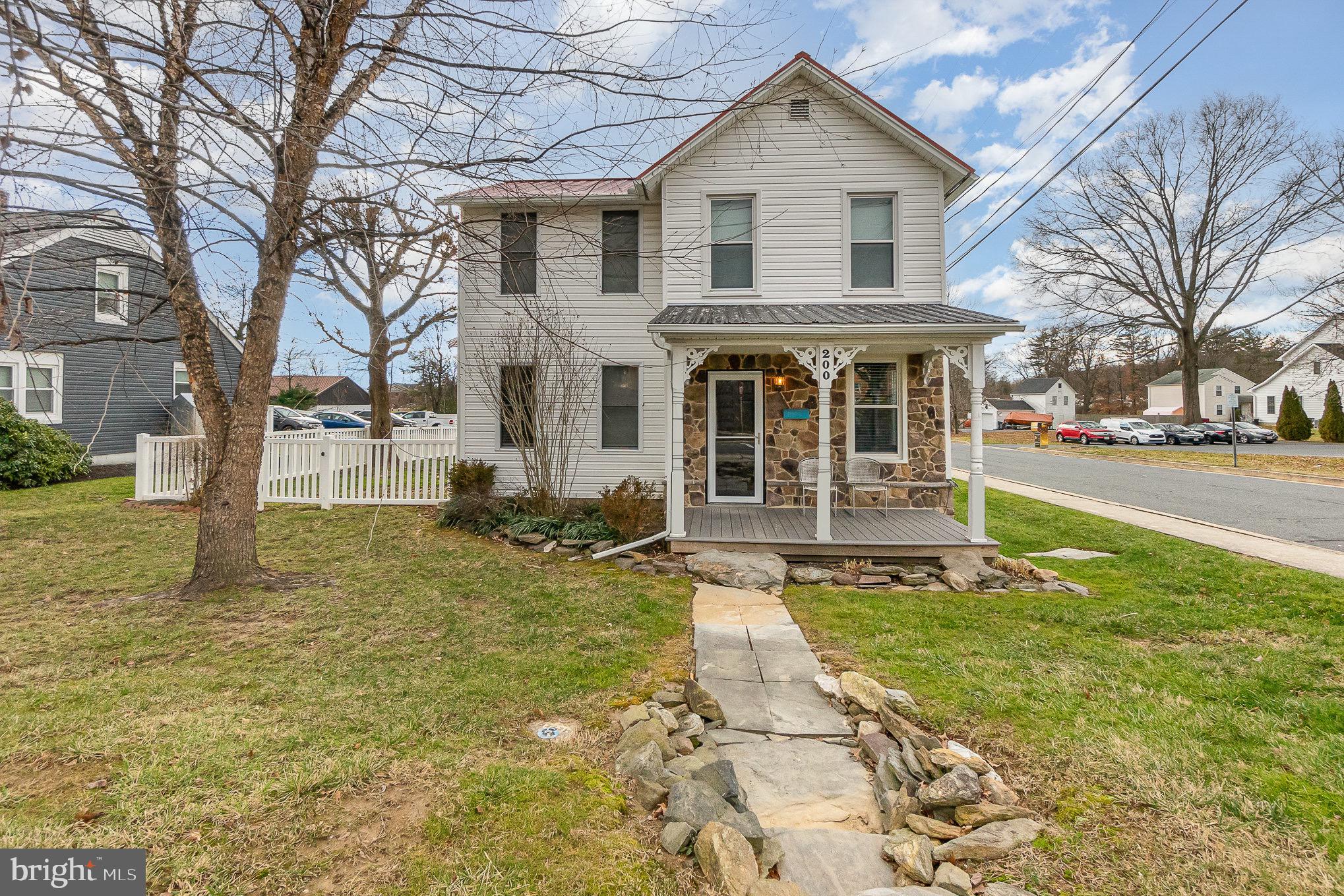 Cozy, quaint and charming  all wrapped up into one!  This freshly painted  2 Bedroom 2.5 Bath historic farmhouse, conveniently located in downtown Bel Air, is everything you could want in a single family home. This home includes an upstairs "bonus room" (that could also serve an a 3rd bedroom, office, playroom, etc.), new laminate flooring on the main level and  original hardwood flooring on second level,  a second level laundry, a full kitchen with stainless steel appliances, a nice sized eating area, a mudroom, a large family room with TONS of natural light and French doors that lead to a beautiful patio and large fenced in back yard.  Another bonus feature of this home is it's main level pellet stove which is perfect to curl up next to on a cold winter's night. This home also has its own private parking pad made of stamped concrete that could easily fit 2 cars, Well maintained and recently updated with a "farmhouse industrial" flare. Come see this rarely available single family rental and make this your home! Walking distance to many restaurants, downtown shops, the county courthouse, local parks and much more!  NO PETS please.