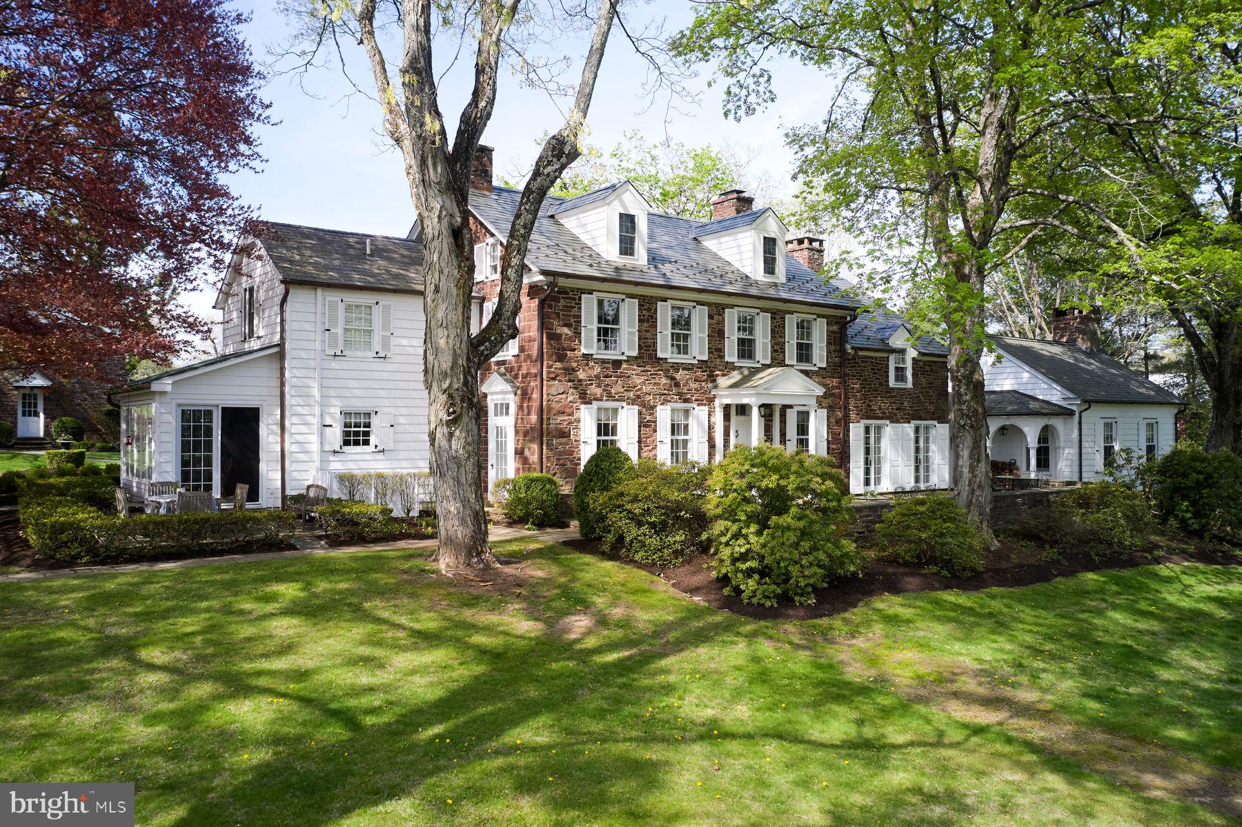 If you are seeking a true Bucks County Estate rich in history and elevated for today's living, then this is it! Overlooking picturesque Cabin Run Creek and bucolic farmland this Bucks County estate dates back to Circa 1785, a rare offering— restored and expanded set on over 12.5 acres of rolling and open land on a postcard setting! At its heart is a magnificent 4 bedroom stone farmhouse, where original character meets refined country living. Rich with exposed stone walls, antique beams, and bespoke craftsmanship, the home opens to a series of inviting outdoor spaces—stone terraces, a walled courtyard, a serene pool setting and gardens bordered by dry-laid stone walls throughout. Ancillary structures include the main barn with radiant-heated, finished lower-level barn currently used as an entertaining and office retreat, but would also make a significant studio space for an artist, designer or can easily be converted back to a working barn with Dutch doors that open to pastoral views. Endless possibilities, with kitchen and full bath. Additionally, a separate oversized 3 car garage with 2 bedroom, light and airy full service carriage house. An additional 24+ acre parcel—unpreserved with its own separate road access is available for purchase. This land offers remarkable potential for equestrian pursuits, farming, pasture, or the creation of a second residence. A setting of rare beauty and privacy, this is more than a home—it is a generational estate in one of Bucks County’s most picturesque valleys. Close to Philadelphia, Doylestown and close proximity to all amenities and I 78. An impressive Country Estate! Additional Lot available, Tax ID 01-019-036, 24.67 Unimproved acres, Zoning is AP, no restrictions, being Sold separately, $750,000