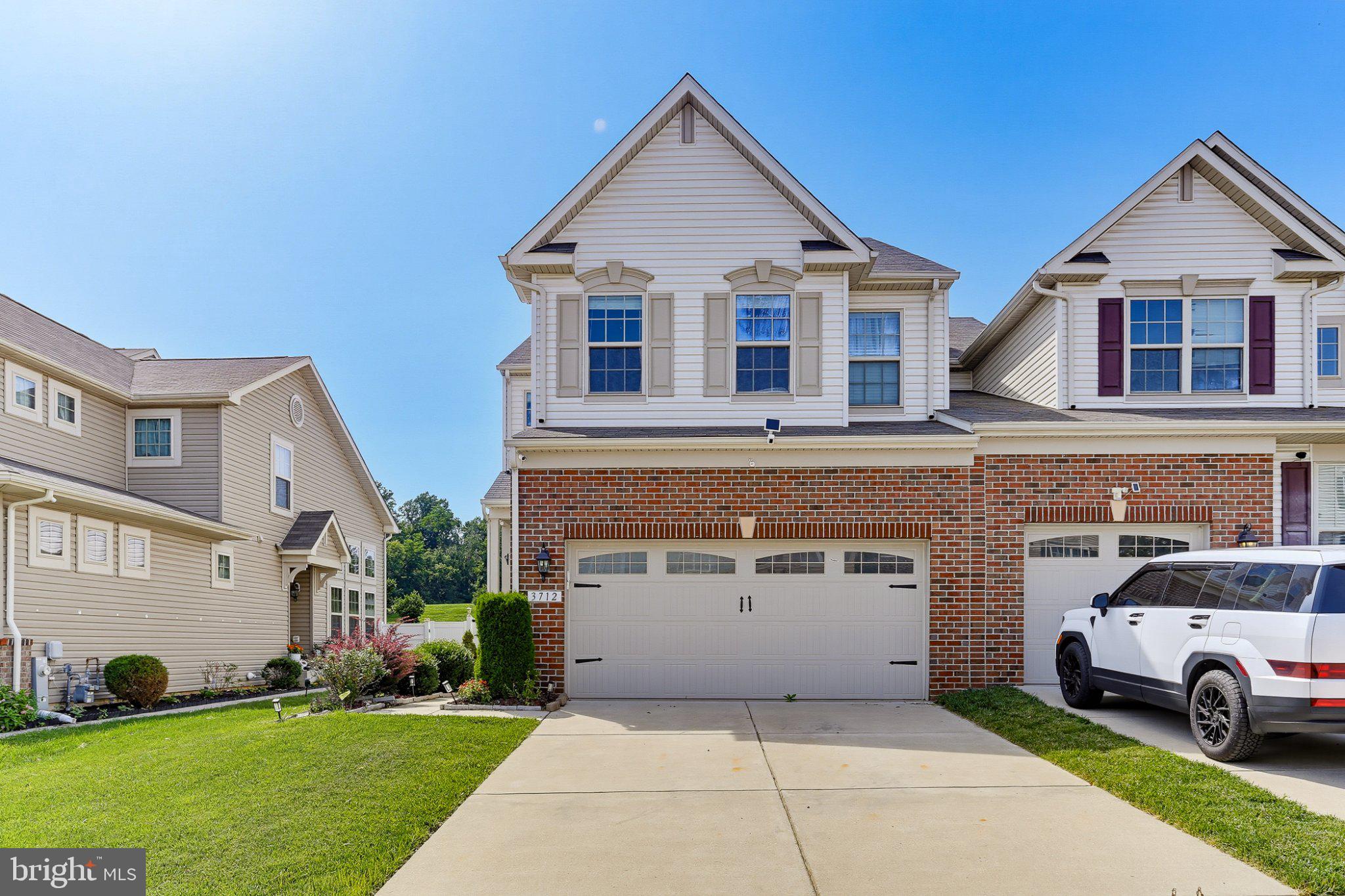 Welcome to 3712 Peace Chance Dr - a beautifully maintained 3-bedroom, 3.5-bath end-unit townhome in the highly sought-after Marriott's Choice community of Randallstown! Offering an ideal blend of space, style, and functionality, this home features hardwood flooring throughout the main level and an impressive two-story living room filled with natural light. The adjoining dining room flows seamlessly into the well-appointed kitchen, complete with granite countertops, stainless steel appliances, and ample cabinet space. A convenient half bath completes the main level. Upstairs, the spacious primary suite serves as a private retreat with a vaulted ceiling, walk-in closet, and luxurious en suite bath featuring a dual vanity, soaking tub, and separate stall shower. Two additional generously sized bedrooms and an updated full hall bath complete the upper level.  The finished lower level offers exceptional flexibility with a large recreation room that can easily serve as a potential fourth bedroom, a full bathroom, and additional storage space.  Step outside to enjoy the rear deck backing to green space—perfect for relaxing or entertaining. A two-car garage provides added convenience and storage. Ideally located close to shopping, dining, parks, and major commuter routes, this exceptional home offers comfort, convenience, and low-maintenance living in one of Randallstown's most desirable communities. Schedule your tour today!