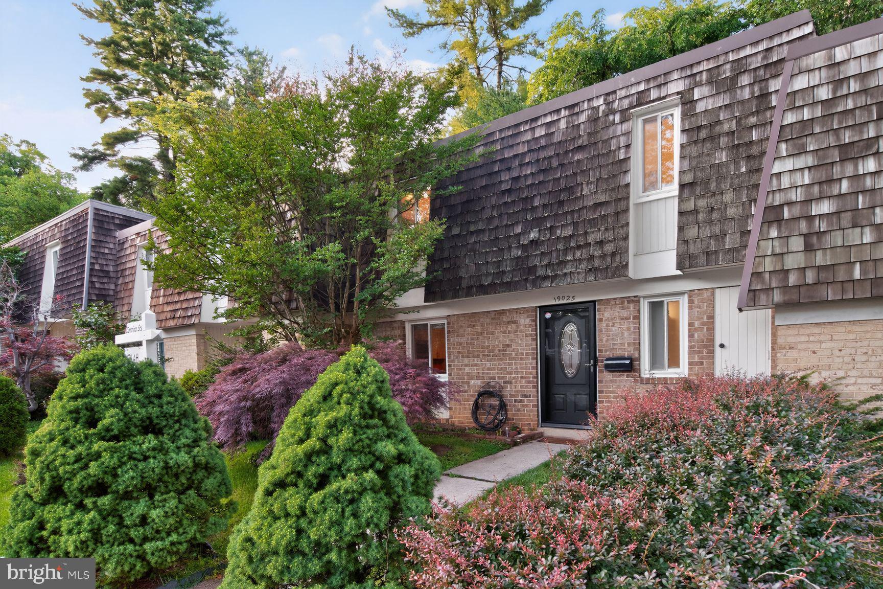 Welcome to this beautifully updated French Provincial-style townhouse in Montgomery Village. This truly move-in-ready home perfectly combines timeless exterior charm with modern interior updates, all while being just minutes from exceptional community amenities, including pools, parks, lakes, walking trails, shopping, and dining. Inside, the thoughtfully designed layout has been freshly painted from top to bottom and features an inviting kitchen equipped with stainless steel appliances, granite countertops, abundant cabinetry for all your storage needs, and a convenient pot filler faucet located right over the stove for effortless cooking. The spacious primary bedroom serves as a relaxing retreat and showcases a striking wood slat accent wall that adds warmth, character, and a custom designer touch. A secondary bedroom features a custom-designed closet system, maximizing organization and functionality. The fully finished lower level provides exceptional versatility and can easily serve as a family room, guest suite, recreation area, or home office. This level also includes a full bathroom and a dedicated laundry room with a newer washer and dryer alongside additional storage space. Step outside to your deeply private backyard retreat, where a spacious, beautifully paved patio creates the perfect setting for grilling, outdoor dining, entertaining guests, or simply relaxing. Because there is no public walking trail directly behind the property, you can enjoy total peace and seclusion. Combining classic curb appeal, thoughtful updates, flexible living spaces, 2 assigned parking spaces, and an unbeatable location, this turn-key home is ready for its next owner to move right in and enjoy.