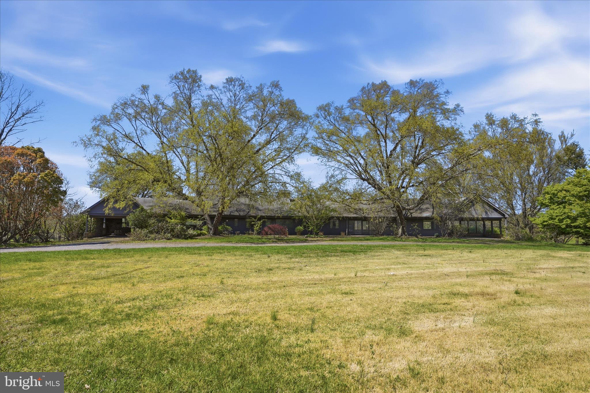 Welcome to Five Points Farm! 
Located less than 15 minutes from Middleburg, this 15-acre property offers an incredible opportunity to build equity and customize an equestrian property in a highly sought-after location. Boasting nearly 7,000 square feet of living space, the main home offers generous room sizes and a layout that is ready to be refreshed and updated for modern living. 
Rooms: The current layout features 4 bedrooms, 4.5 baths, two full kitchens, and one kitchenette.
En Suite Area: A highly versatile addition to the floor plan is a distinct secondary living area complete with its own kitchen and spacious bath. Whether utilized as an in-law suite, guest quarters, or a farm manager's apartment, this space adds fantastic functional value.
Equestrian Amenities: For the horse enthusiast, the property provides the essential elements needed to create a thriving equestrian setup.
Stable & Pastures: An existing horse barn/stable with 6 stalls and established fenced pastures provide a solid starting point for your horses. The barn has electric and water and features an office/tack room. 
Excellent Ride-Out: One of the property’s most valuable assets is its location within a prime equestrian corridor, offering fantastic ride-out right from your property line into the beautiful Virginia countryside.
The Location: Enjoy the peace and privacy of rural Fauquier County without sacrificing convenience. You are just a short, scenic drive (10-15 minutes) from Middleburg's renowned shops, fine dining, and rich equestrian culture, offering the ultimate Virginia hunt country lifestyle.
The Bottom Line: Properties with this combination of acreage, square footage, and prime ride-out so close to Middleburg are a rare find. Bring your contractor and your imagination to restore this property to its full potential.
