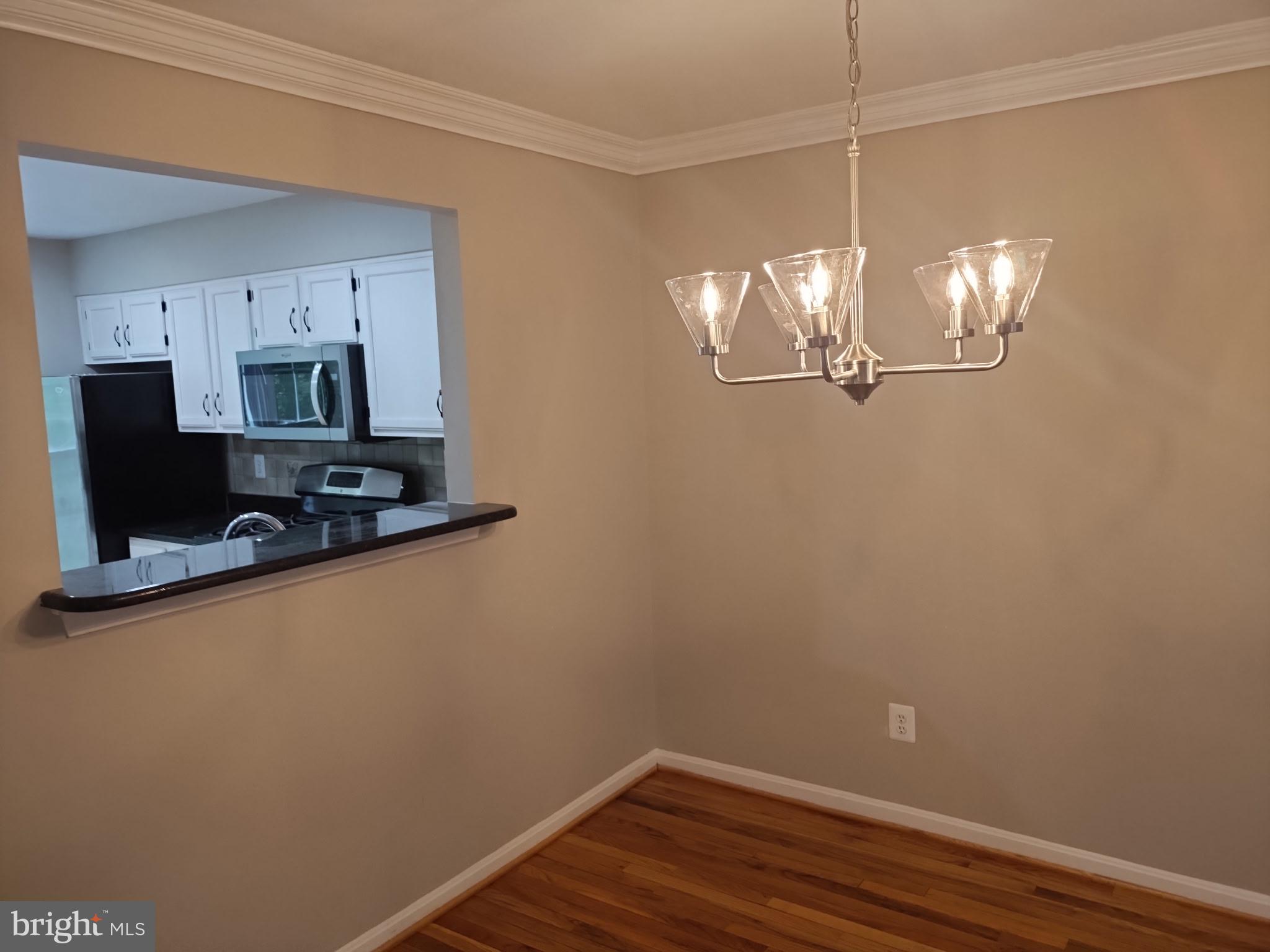 Floors on Main, W/O Patio, French Doors, Fully Finished BSMT w/TV Nook & Bar, Fenced Yard, 1-Car Garage w/Opener. All BRs has Vaulted Ceilings & Shelf,  MBR has WIC & Double Sinks. KIT has SS appliances..  LL has  French Doors to w/o Brick Patio. Main w/o to Deck All new windows and sliding door.. New pipes installed thru out.