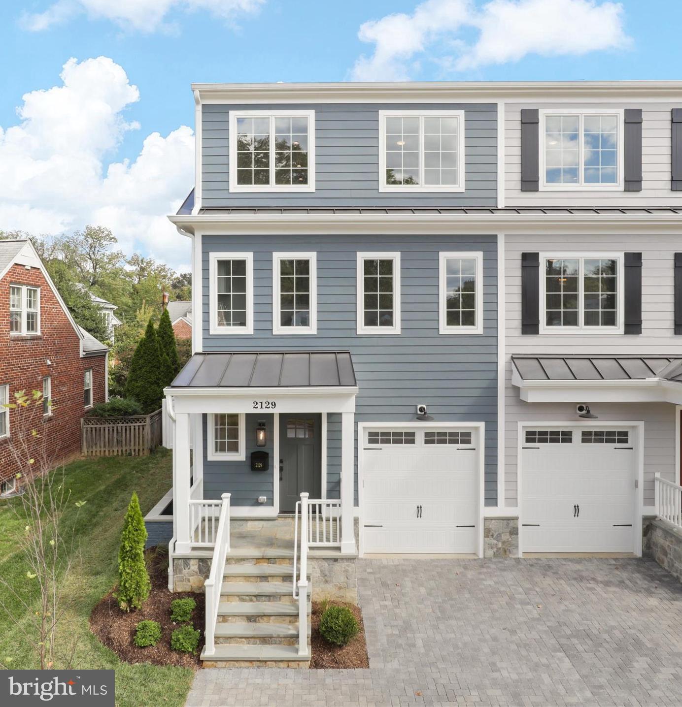 ONLY 1 LEFT………READY FOR NEW HOMEOWNER…Luxury Living in the Heart of North Arlington. Welcome to 2129 N. Troy Street, an elegant and meticulously crafted 5-bedroom, 3.5-bath semi-detached/duplex tucked away on a quiet cul-de-sac in one of Arlington’s most desirable neighborhoods—just a short stroll to the vibrant Courthouse area. Spanning 2,470 square feet across 3 beautifully designed levels, this home offers the perfect blend of style, space, and functionality. Highlights include gleaming hardwood floors, a cozy fireplace with built-ins on each side, a private roof deck accessed from the loft and Bedroom 3, and a patio in the fenced-in yard—ideal for both relaxing and entertaining. The gourmet kitchen is a chef’s dream, featuring a large island, Thermador stainless steel appliances, upgraded quartz countertops, and Decora semi-custom cabinetry. Enjoy the luxury of Andersen Series 400 windows, a spa-inspired marble primary bathroom, and an expansive California closet in the primary suite closet. The versatile third floor loft includes two spacious bedrooms, a den/office, and access to the rooftop deck with treetop views. A one-car garage completes the package, offering both convenience and security.  With unbeatable access to top-rated schools, parks, metro stations, and Arlington’s best dining and shopping, this home truly has it all. Experience refined urban living at its best. Make arrangements for a private showing,