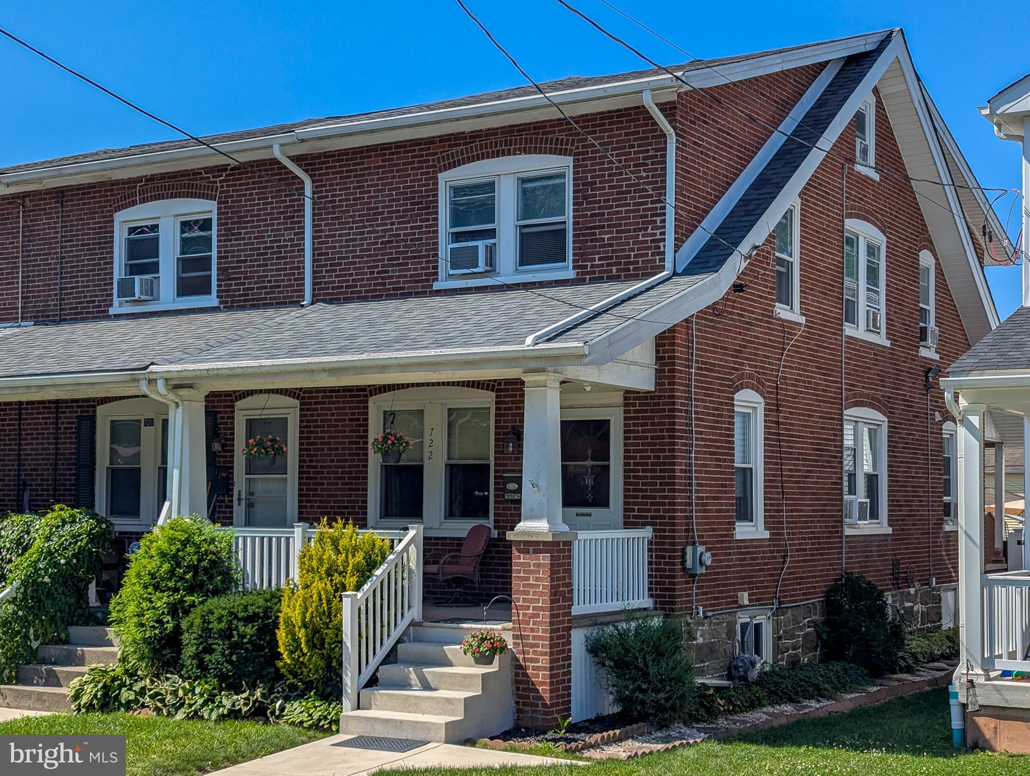 Welcome home to this solidly built brick end-unit row home that perfectly blends old-world charm with modern convenience. A welcoming front porch sets the tone for the warmth and character you'll find inside. The main level features spacious living and dining rooms, a large eat-in kitchen, convenient mud room, and a powder room.

Step outside to enjoy the expansive rear deck overlooking the fully fenced backyard—ideal for entertaining, gardening, or relaxing. A solid brick one-car garage, attached storage shed, and an additional off-street parking space provide exceptional convenience.

Upstairs, the second floor offers three comfortable bedrooms and an updated hall bath featuring a large stall shower. The finished third floor provides a versatile fourth bedroom, home office, or the perfect hangout space.

Additional highlights include economical natural gas heat, gas cooking, a partially finished basement with abundant storage, and the washer, dryer, and refrigerator—all included with the sale.

Ideally located within walking distance of the Lansdale SEPTA Regional Rail station, downtown Lansdale's popular restaurants, shops, parks, and community events. Situated in the award-winning North Penn School District, this move-in ready home offers timeless character, practical amenities, and an unbeatable location. Don't miss this opportunity!