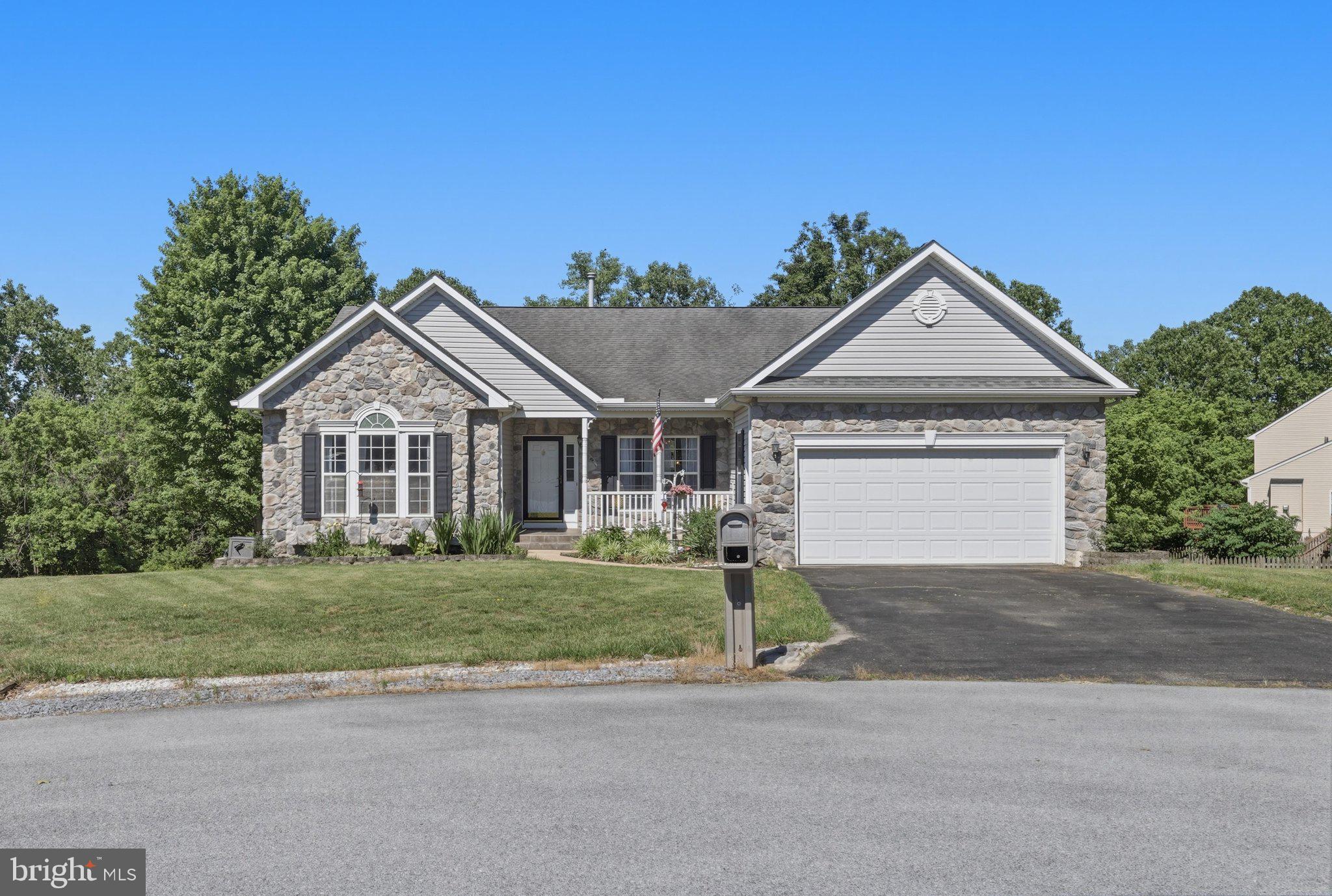 Nestled on a quiet cul-de-sac in the desirable Stonebridge community, this well-maintained home offers comfortable one-level living with the added flexibility of a fully finished walk-out basement. Hardwood floors welcome you into the foyer, which opens to the formal living and dining rooms. At the heart of the home, the family room with a gas fireplace and vaulted ceiling flows seamlessly into the kitchen and breakfast area. The primary suite provides a private retreat with a vaulted ceiling, walk-in closet, and en-suite bath featuring a jetted tub, separate shower, and vanity. Two additional bedrooms, a full hall bath, and a convenient laundry room complete the main level. Downstairs, the fully finished walk-out basement functions as a complete secondary living space, featuring its own kitchen, full bath, built-in bench seating with storage, and a private exterior entrance—ideal as an in-law suite, guest quarters, or rec room. An unfinished area provides additional storage and includes a workbench for projects and hobbies. Outside, enjoy the fully fenced backyard with a patio and gazebo, a newer deck (2024) with a lean-to cover, and generous under-deck storage. The home backs partially to the Van Metre 9 at Stonebridge Golf Course, providing added privacy and a peaceful setting. Adding to the home’s appeal is an oversized two-car garage featuring convenient built-in shelving. Recent updates include a new water softener and expansion tank (2025), along with a new dishwasher and water heater (2026). Residents of Stonebridge enjoy access to a community pool, tennis courts, and playground, all conveniently located near shopping, dining, schools, the golf course, and major commuter routes. Don't miss this opportunity—schedule your private showing today!