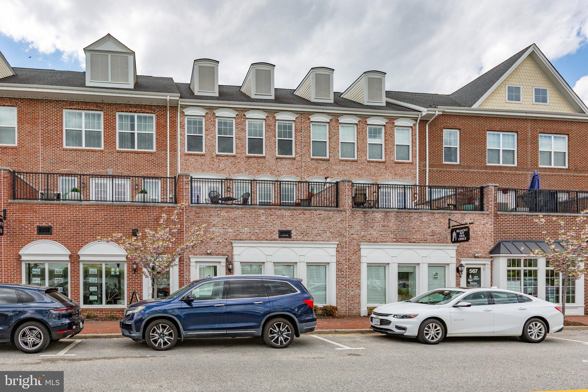 Welcome to this beautifully appointed 3-bedroom, 3-bath condo offering stunning water views and exceptional finishes throughout. From the moment you step inside, you'll appreciate the hardwood floors and elegant crown molding. The spacious kitchen is a chef’s dream, featuring plenty of cabinet space, a central island, granite countertops, upgraded hardware, and plenty of prep space for entertaining or everyday living. Each bedroom is equipped with ceiling fans for added comfort, and the well-designed floor plan provides privacy and functionality. The primary suite is a true retreat, boasting a luxurious en-suite bath with dual vanity sinks, a relaxing soaking tub, and a separate walk-in shower. Convenience is key with a front-load stackable washer and dryer included in the home. Step outside to your private outdoor living area—perfect for enjoying morning coffee or evening sunsets overlooking the water. Whether you're hosting friends or savoring a quiet moment, the views and atmosphere are sure to impress. Community amenities include an outdoor pool, walking paths, planned events and tennis courts. Close to the VRE, commuter lots, Rt. 1 and I-95! Don’t miss your opportunity to own this stylish and serene waterfront escape!