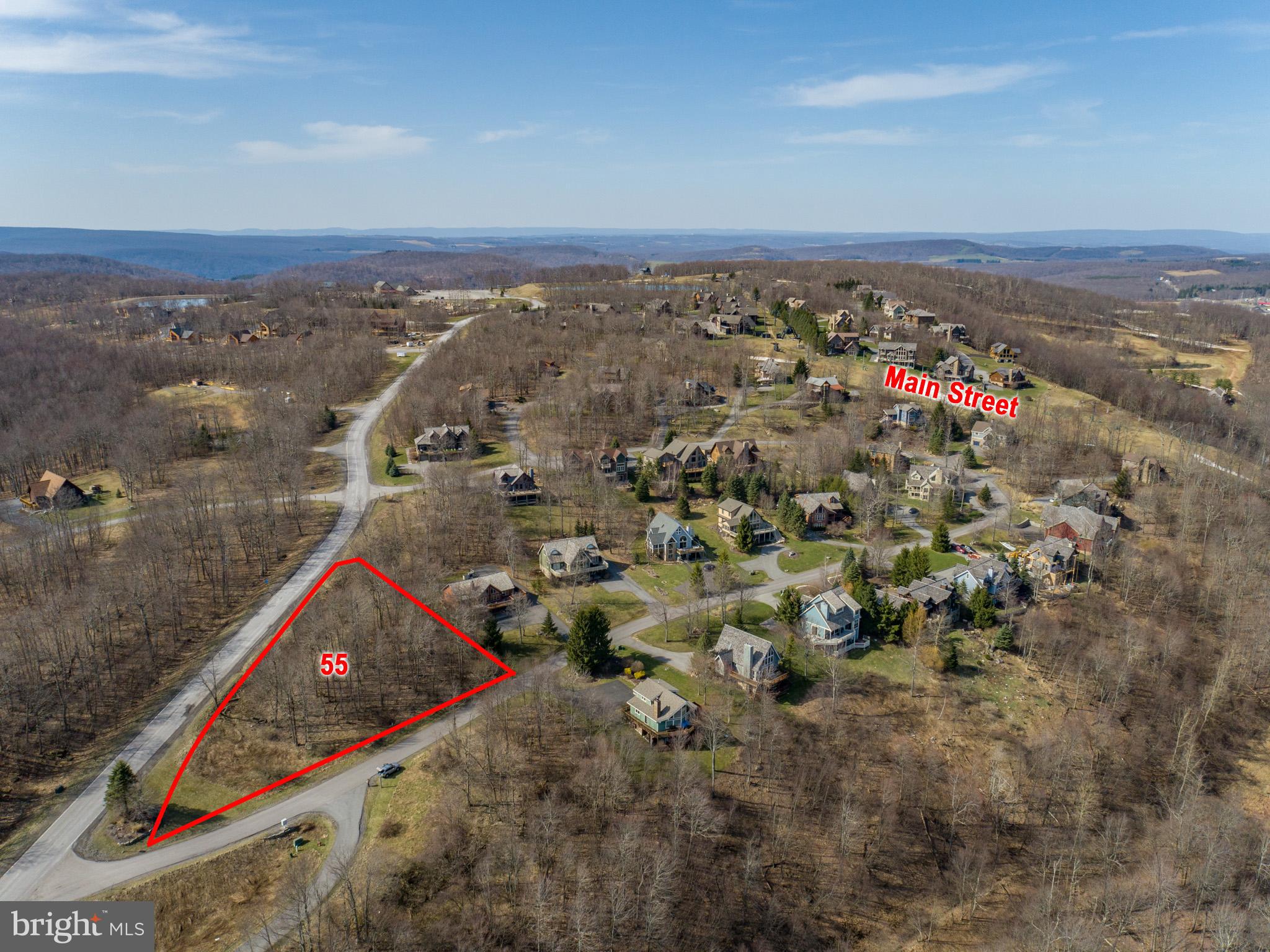 Happy New Year with a price adjustment on this mountaintop lot in the Highline community! If you love the mountains, the lake, snow and golf-take a look at this location and bring your home plans that will take advantage of all these beautiful aspects of Garrett County! Natural wooded landscapes surround you.  It is an easy walk along the community's slope access trail to the Main Street slopes.   Utilities to site for this .51 AC lot include the availability of public water & sewer hook-ups, propane gas, high speed cable internet access and on-site trash service. 
Check this out now!