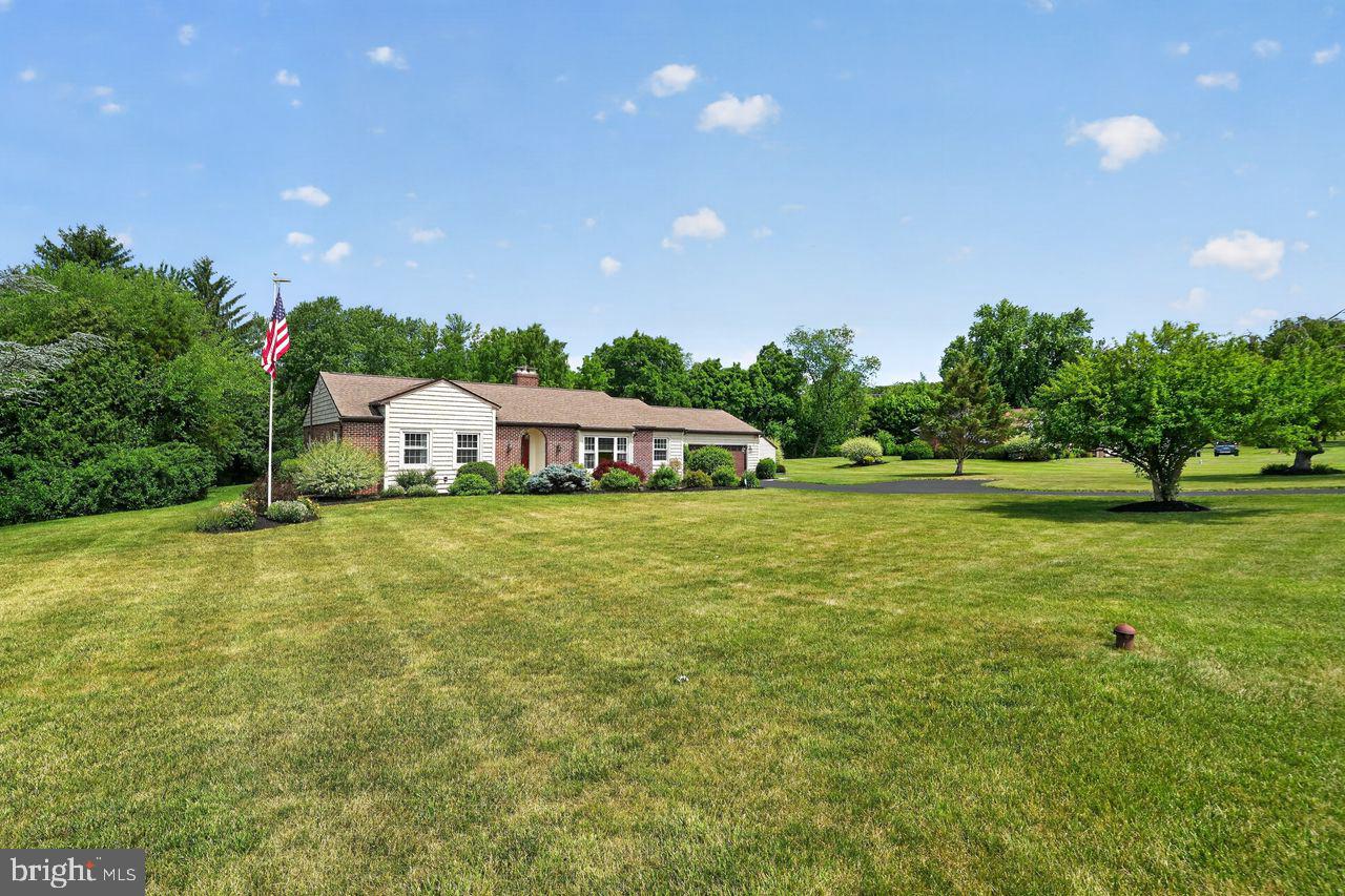 Welcome home to this beautifully maintained ranch nestled in desirable Lower Salford Township. Boasting lovely landscaping, outstanding curb appeal, and an impressive list of updates, this move-in ready home offers the perfect blend of comfort and style. A brick paver walkway leads to the covered front entrance and into a welcoming foyer. Cherry hardwood floors flow throughout the main living areas, complemented by elegant crown molding, chair rail, recessed lighting, and thoughtful custom details. The inviting living room features a charming window seat, glass French doors, and abundant natural light. The adjoining dining room is ideal for both everyday meals and special occasions, showcasing beautiful wainscoting, crown molding, chair rail molding, and a stylish chandelier that adds warmth and sophistication to the space. The updated kitchen is the heart of the home, featuring Corian countertops, tile backsplash, a pantry with pull-out drawers, abundant cabinetry and workspace, under-cabinet lighting, bar stool seating, an electric wall oven, 5-burner cooktop with Jenn-Air exhaust vented to the exterior, and a newer dishwasher. The adjoining family room offers a propane fireplace with a stacked stone surround and blower, creating a warm and inviting gathering space. Step outside through the updated slider to your own private retreat. The maintenance-free deck is complete with a gazebo, rope lighting, and deck and post lighting, step down to the stamped concrete patio all overlooking the peaceful, private backyard—perfect for entertaining or simply unwinding at the end of the day. A spacious storage shed provides ample room for all of your gardening tools, lawn equipment, seasonal décor, and outdoor essentials, offering both convenience and added functionality. The spacious primary suite features a custom walk-in closet and an updated bath with tile flooring and a walk-in shower. Two additional bedrooms offer generous closet space, recessed lighting, and ceiling fans. An updated hall bath, first-floor laundry room with utility sink and storage shelves, and convenient access to the two-car garage and the patio add to the home's functionality. The full unfinished basement provides endless storage possibilities and includes storage shelving and a cedar closet. Additional upgrades include updated windows throughout with lifetime transferable warranty, newer HVAC, primary bathroom, tankless water heater, water softener, gutters, and a new washing machine. Ideally located just moments from Indian Valley YMCA, Henning’s Market and conveniently close to the PA Turnpike (Northeast Extension), this home provides easy access to Philadelphia Premium Outlets in Limerick, King of Prussia Mall, Doylestown with its top-rated restaurants and shopping, scenic township parks, and historic Skippack Village, known for its charming boutiques, fine dining, and antique shops. All of this is complemented by the highly regarded Souderton Area School District. Don’t miss this opportunity to make this well-loved home your own—truly a place to call “Home Sweet Home.”  KINDLY REVIEW THE ATTACHED VIDEO.