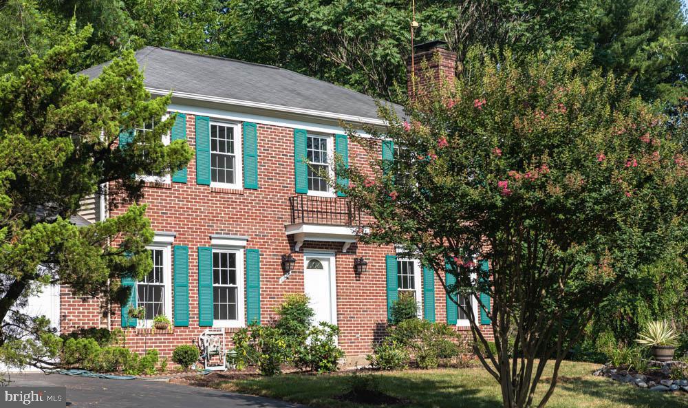 Price reduced $65,000. *OUTSTANDING VALUE in GREAT FALLS!! 3 Miles to Tysons Metro Station - Handsome Brick Colonial with Two-Car Garage on Over Half Acre in Wolf Trap Green!-Gorgeous Curb Appeal in sought after Cul-De-Sac .**All New Windows** All Bathrooms Updated 2020** AC & Furnace 1-year-old** Kitchen Updated 5 years ago** New Paint ** New Carpeting 2021 ** All light fixtures 2021 New Addition Large Sunroom 2020.  Minutes to Tysons, Spring Hill Metro, Great Falls Park, Wolftrap! 30 Min. to DC, MD, Dulles Airport!-Newly Remodeled Bathrooms with New Vanities, Fixtures, and Designer Ceramic Tile!-Newly Installed Carpet! Fresh Interior Paint!-Kitchen Has Granite, Stainless, and Center Island-Hardwoods in LR, DR, and Den-Two Brick Woodburning Fireplaces!-Breakfast Room Walk Out to Spacious Solarium Leading to Patio!-Lush Landscaping and Trees Surrounding House- Very Deep Back Yard Ready for All Your Outdoor Activities and Entertaining! Langley High School Pyramid.