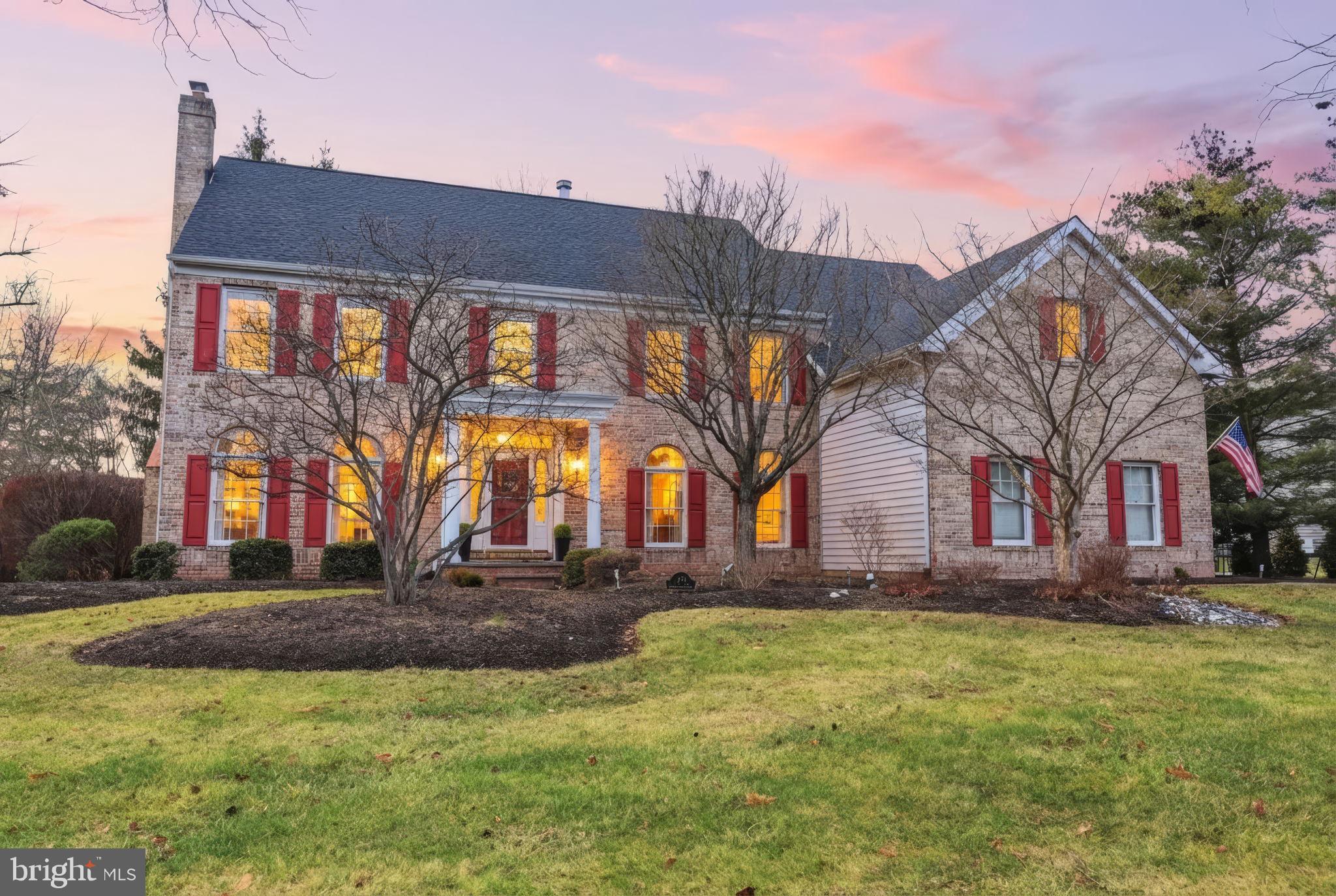 Set back on a quiet, established street, 1476 Brookfield Road is the kind of home that feels right the moment you arrive. The curb appeal is classic and timeless, but it’s what unfolds inside that truly sets this property apart.

Nearly 3,900 square feet of thoughtfully designed living space blends classic architecture with everyday comfort. Hardwood floors, custom millwork, and carefully chosen finishes create a sense of quality that carries throughout the home. Rooms flow naturally, offering both defined spaces for entertaining and open areas that invite connection.

The kitchen sits at the heart of the home. Warm, functional, and built for real life, opening seamlessly into the main living areas and out to the deck and backyard. Whether it’s quiet mornings, family dinners, or hosting a full house, the layout simply works.

Upstairs, the primary suite feels like a true retreat, complete with a spa-inspired bath, and generous closet space. Three additional bedrooms and well-appointed baths provide flexibility for family, guests, or home offices without compromise.

The finished lower level adds an entirely new dimension, ideal for a home office, recreation, fitness, media, or future customization - while still leaving ample storage space. A three-car garage, abundant closets, and a 4 bathroom layout round out a home designed to support both daily living and long-term ownership.

Surrounded by mature landscaping, a short walk to Memorial Park, and located just minutes from Yardley and Newtown Boroughs and commuter routes, this is a property that offers presence, privacy, and practicality in equal measure.