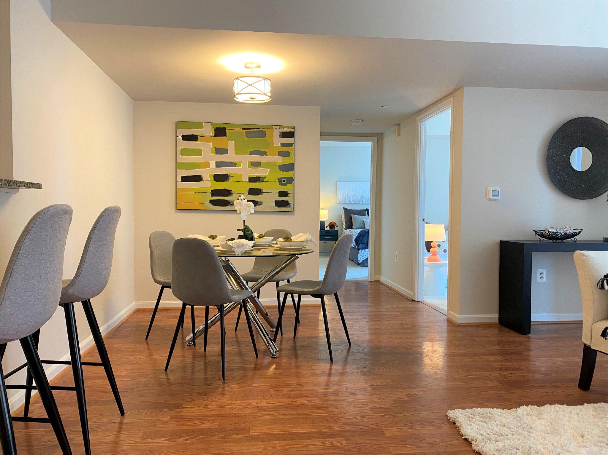 Sought-after luxury Gallery condo, rarely available 2-bedroom 1-bath unit. Open layout, nicely appointed rooms totaling 1038 SF. Major upgrade in 2021 included new kitchen cabinets, granite countertop and SS appliances, custom made cabinets improved organization in the spacious walk-in closet. Water heater replaced in 2018.  One-block away from the metro red-line. Close to shopping in nearby Harris Teeter, Wholefoods or nice selection of restaurants in downtown Rockville. Balcony view of the sparkling clear water of the resort style outdoor pool in the beautifully landscaped common area.
