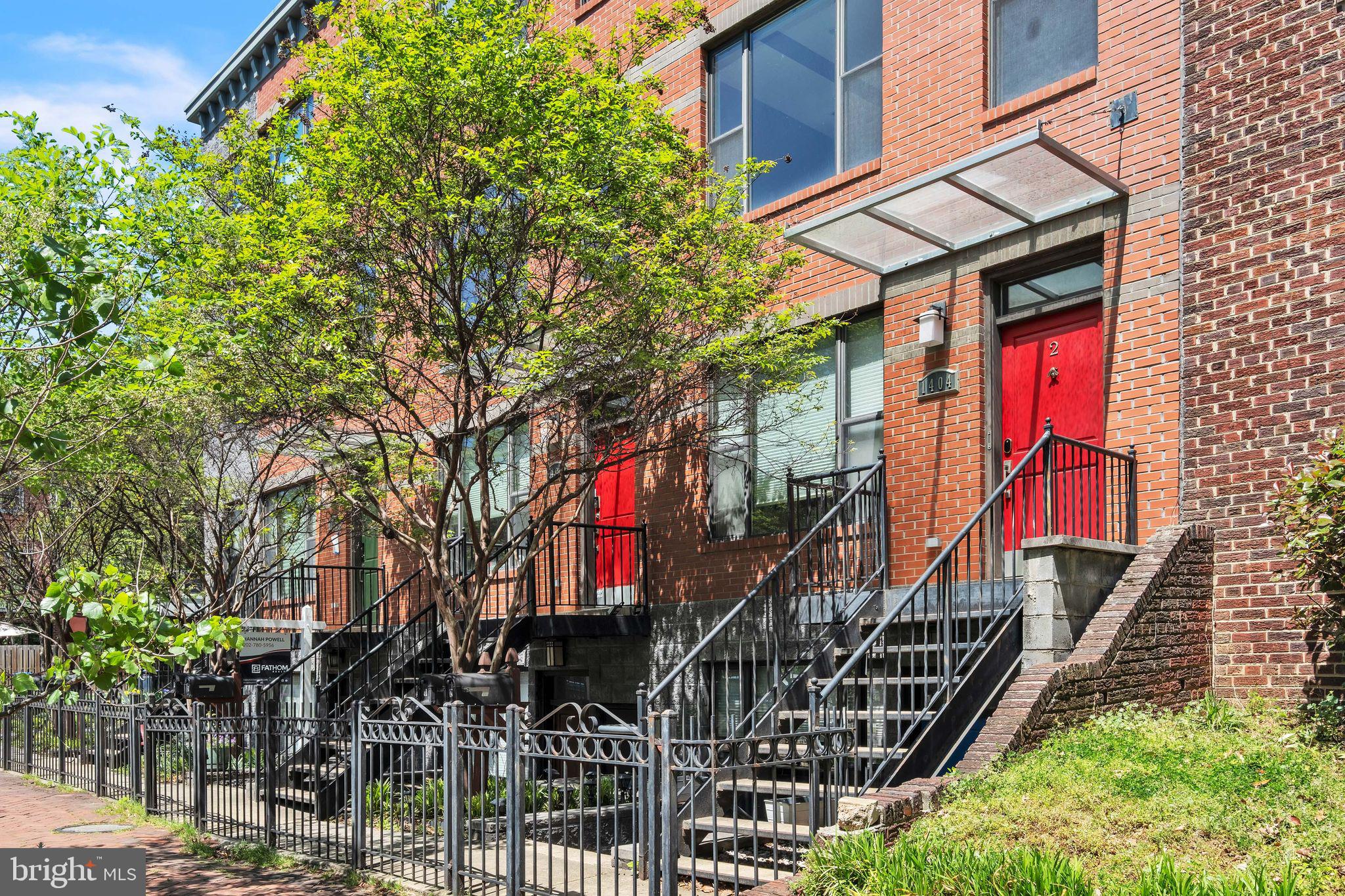 This bright and open 2-level loft-style condo in Capitol Hill offers over 1,500 sq. ft. of modern living space. Features include soaring ceilings, massive windows, and warm hardwood floors throughout. The gourmet kitchen boasts granite countertops, wood cabinets, stainless steel appliances, and a pantry. The second-story loft overlooks the first floor and is ideal for a media room, office, or exercise space.  The master suite on the upper level includes a luxurious bath with a spa-like multi-function shower and double vanity. Both spacious bedrooms have private balconies and walk-in closets. Additional amenities include a massive common roof deck with sweeping views, a tankless hot water heater, and assigned parking. The condo is pet-friendly and has a very low HOA fee. Located close to Metro, Harris Teeter, dining, nightlife, shopping, gyms, parks, and more.