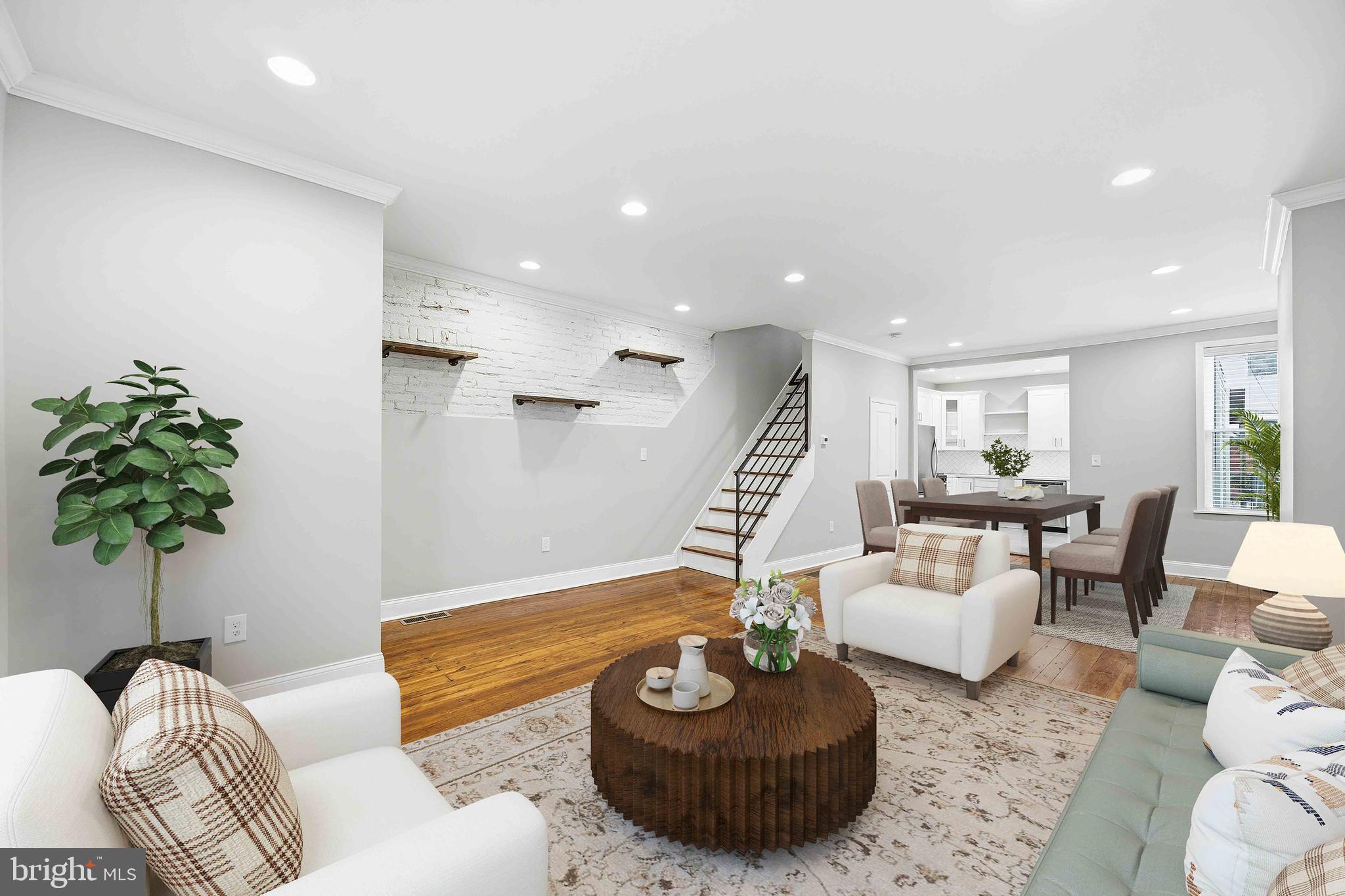 Welcome to 4127 Manayunk Ave -- where charm meets modern updates in this 3‑bed, 1.5‑bath Manayunk gem. Step inside to be welcomed into a bright, open living space where exposed brick and beautiful hardwood floors steal the show. The living area flows seamlessly into the dining area and your updated chef’s kitchen. The kitchen is complete with white cabinetry, quartz countertops, stainless steel appliances, and a crisp subway‑tile backsplash. In the back of the house, a rear mudroom adds everyday convenience with a dedicated laundry area, an updated powder room, and direct access to the backyard. Outside, multiple entertainment areas offer the perfect setting for relaxing, hosting friends, or enjoying summer night BBQs. Upstairs, you’ll find three comfortable bedrooms and a recently updated hall bath featuring a double‑sink vanity and classic white subway tile throughout. The large primary bedroom sits at the front of the home and provides ample amount of closet space. All of this is just moments from Main Street Manayunk, where shops, restaurants, cafés, and nightlife are plentiful - giving you the perfect blend of neighborhood charm and urban convenience. Close proximity to major highways makes commuting a breeze. Schedule your showing today to make this home your own!